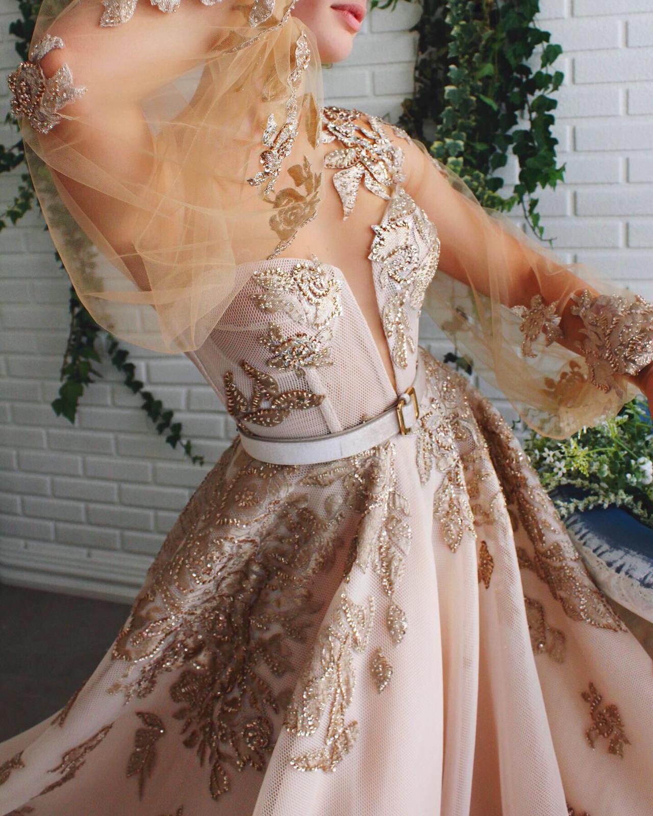 Beige A-Line dress with belt, long sleeves and embroidery