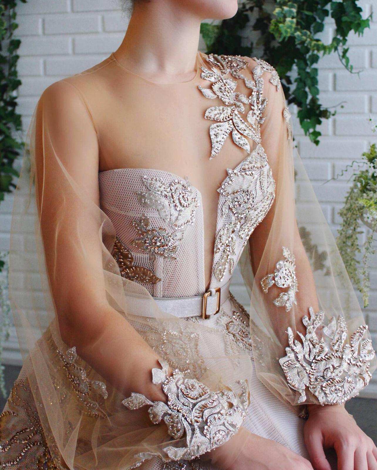 Beige A-Line dress with belt, long sleeves and embroidery