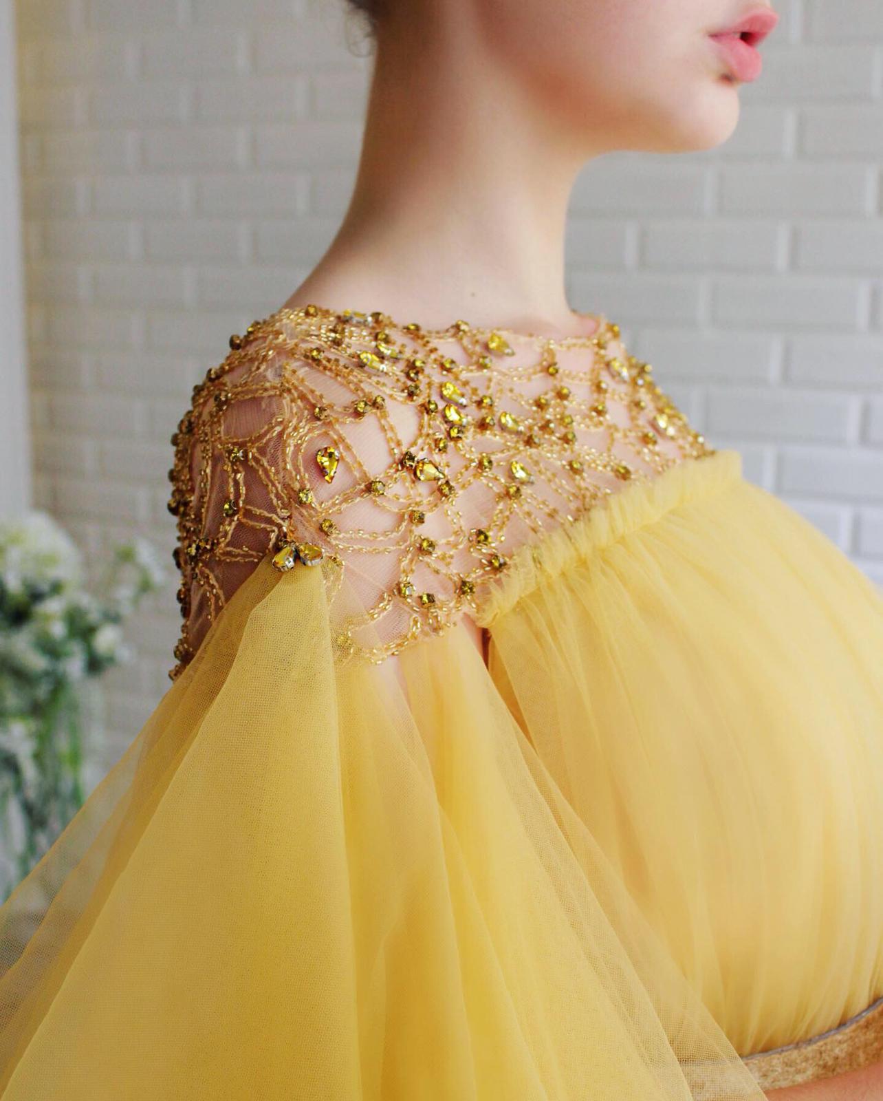 Yellow A-Line dress with short sleeves, belt and embroidery