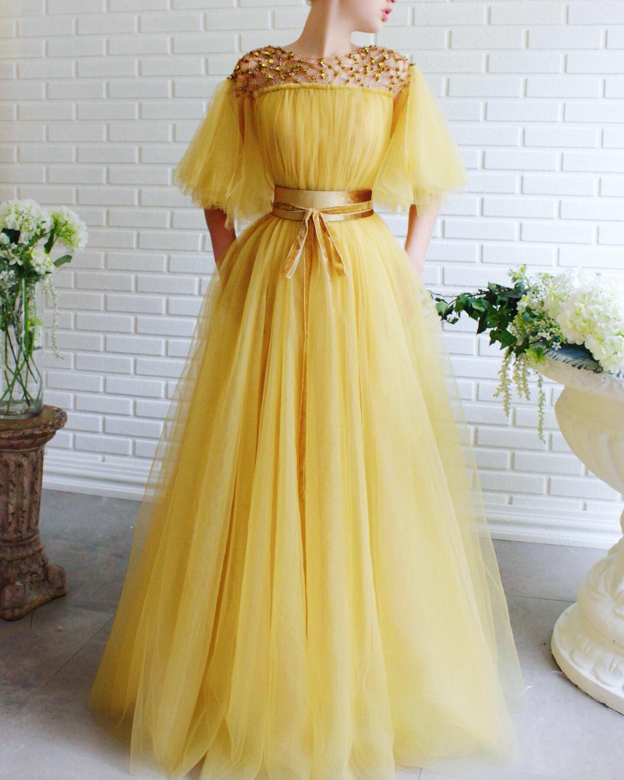 Yellow A-Line dress with short sleeves, belt and embroidery