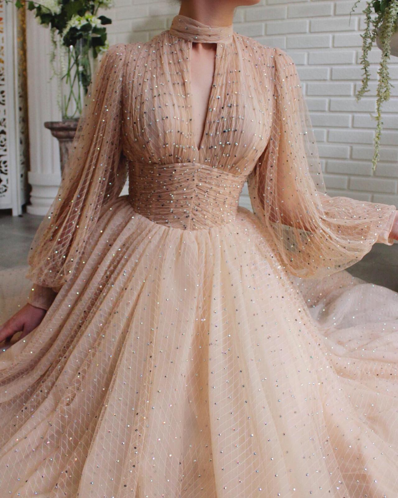 Beige A-Line dress with beading and long sleeves