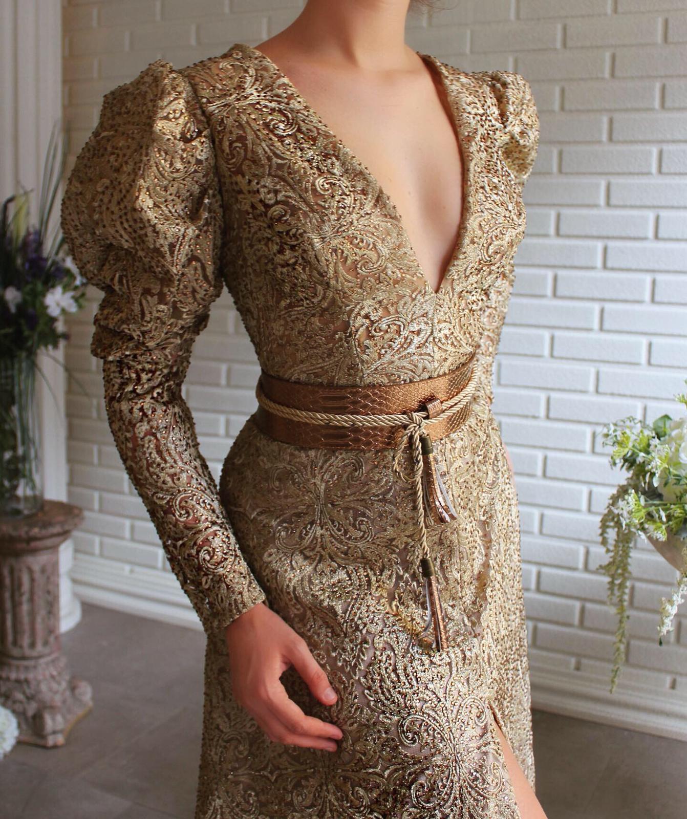 Beige A-Line dress with long sleeves, v-neck and belt