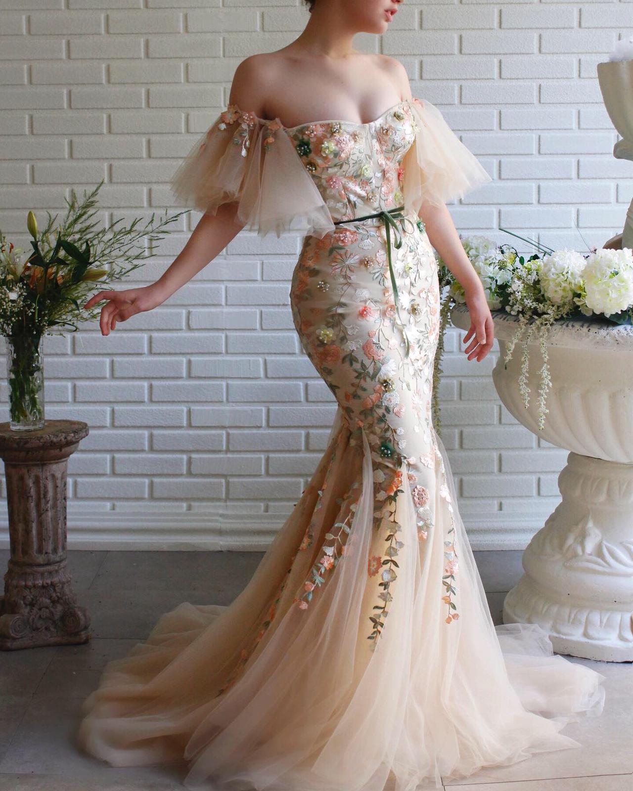 Beige mermaid dress with embroidery and off the shoulder sleeves