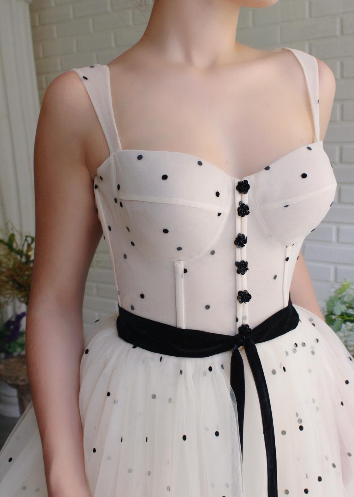 Beige A-Line dress with straps and dotted fabric