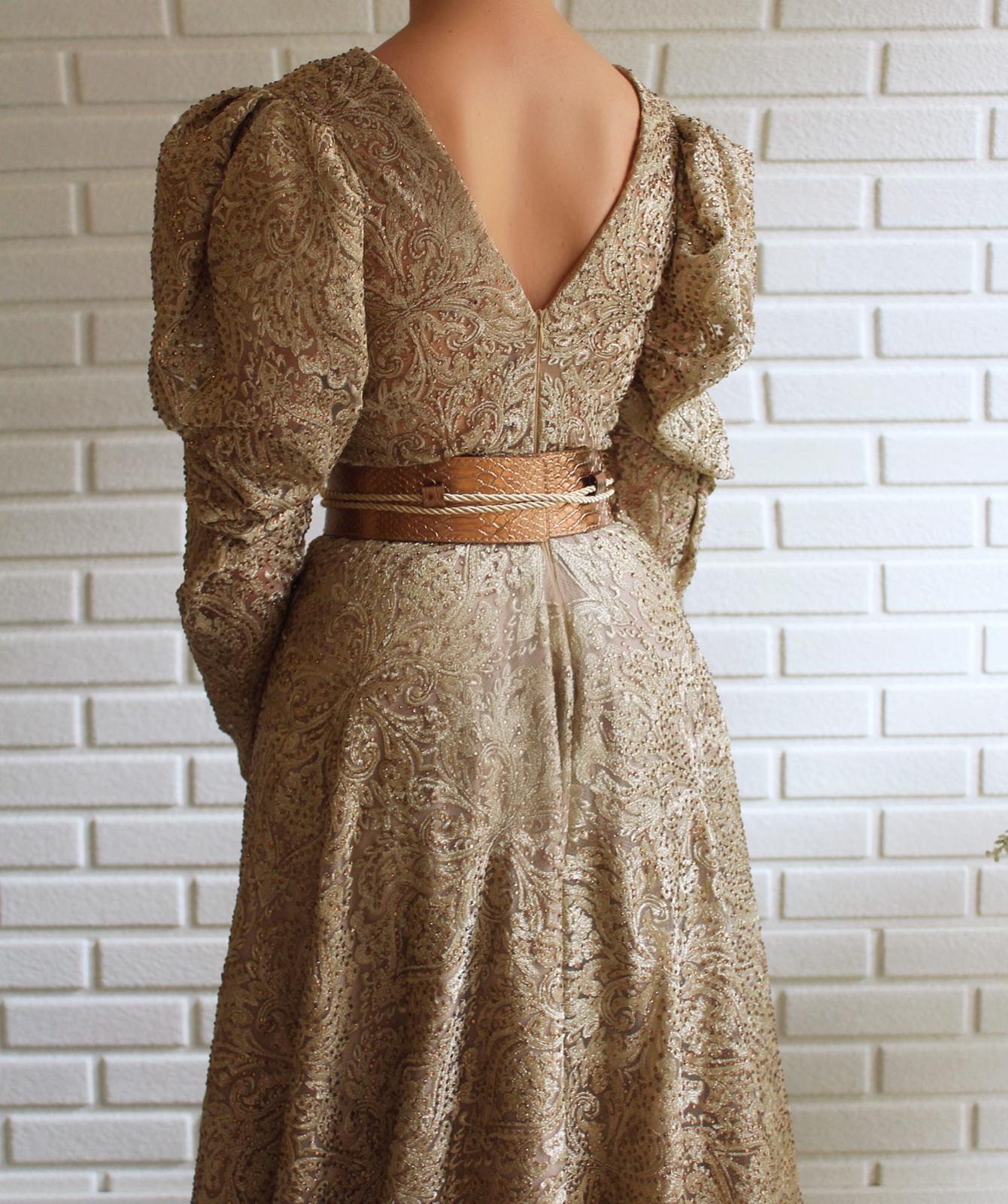 Beige A-Line dress with long sleeves, v-neck and belt