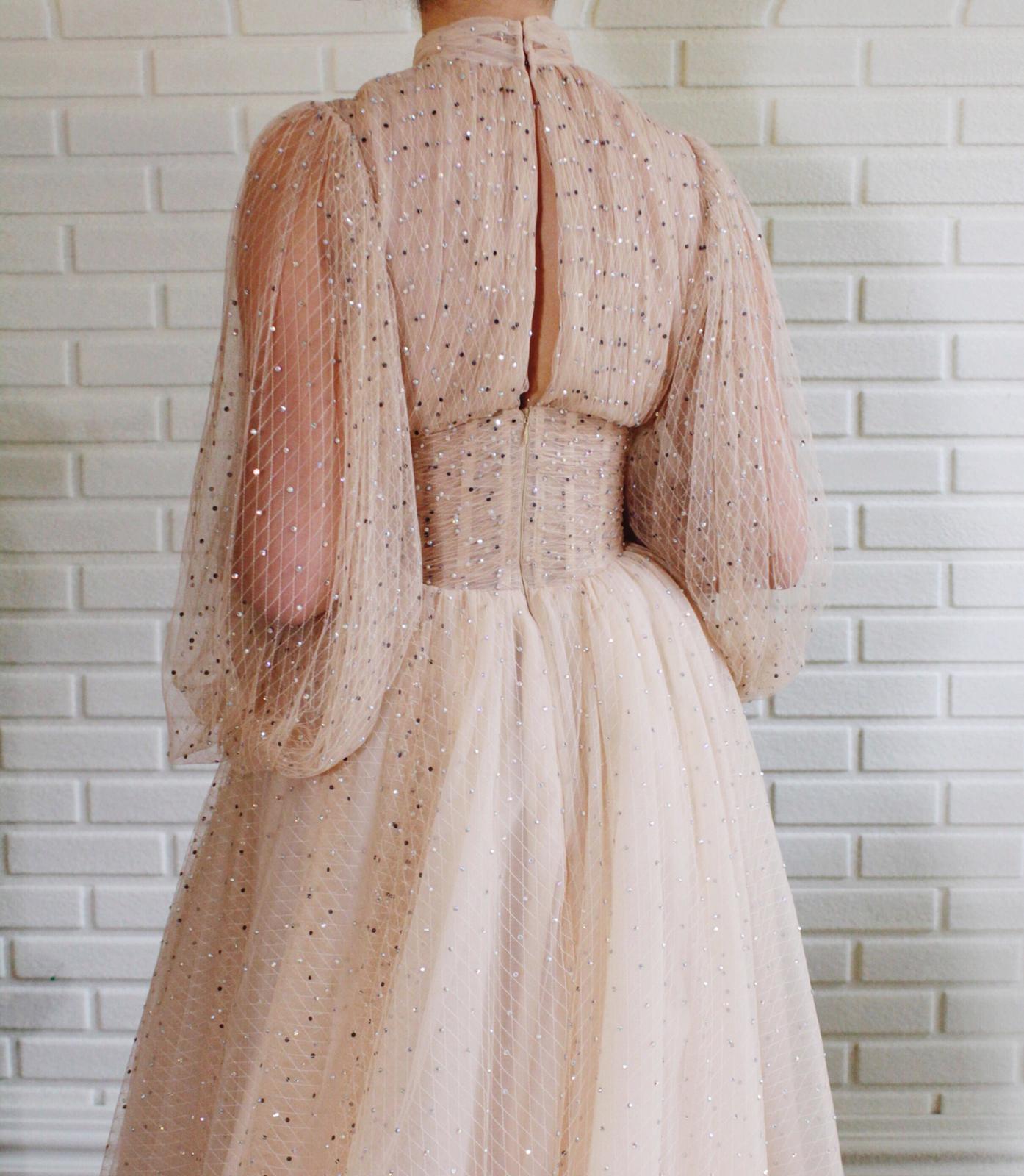 Beige A-Line dress with beading and long sleeves