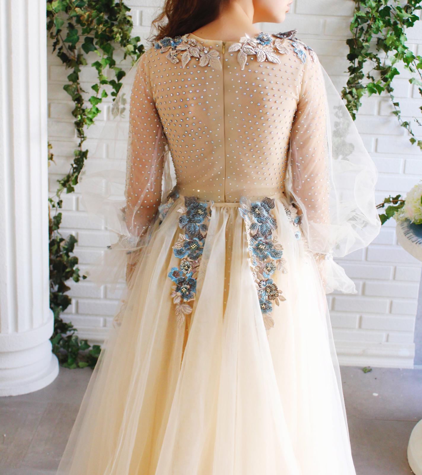 Beige overskirt dress with long sleeves and embroidery