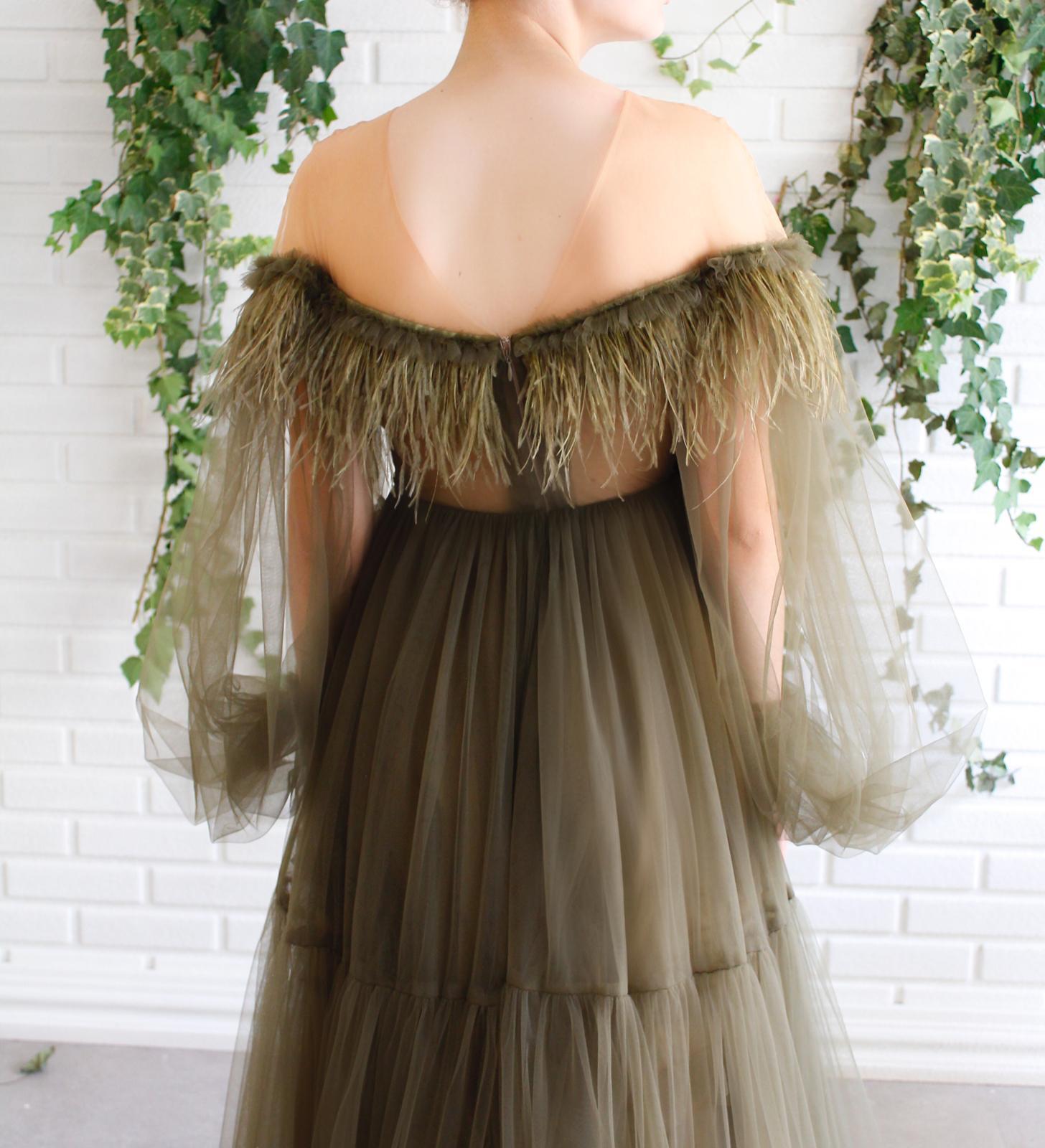 Green A-Line dress with off the shoulder sleeves, embroidery and feathers