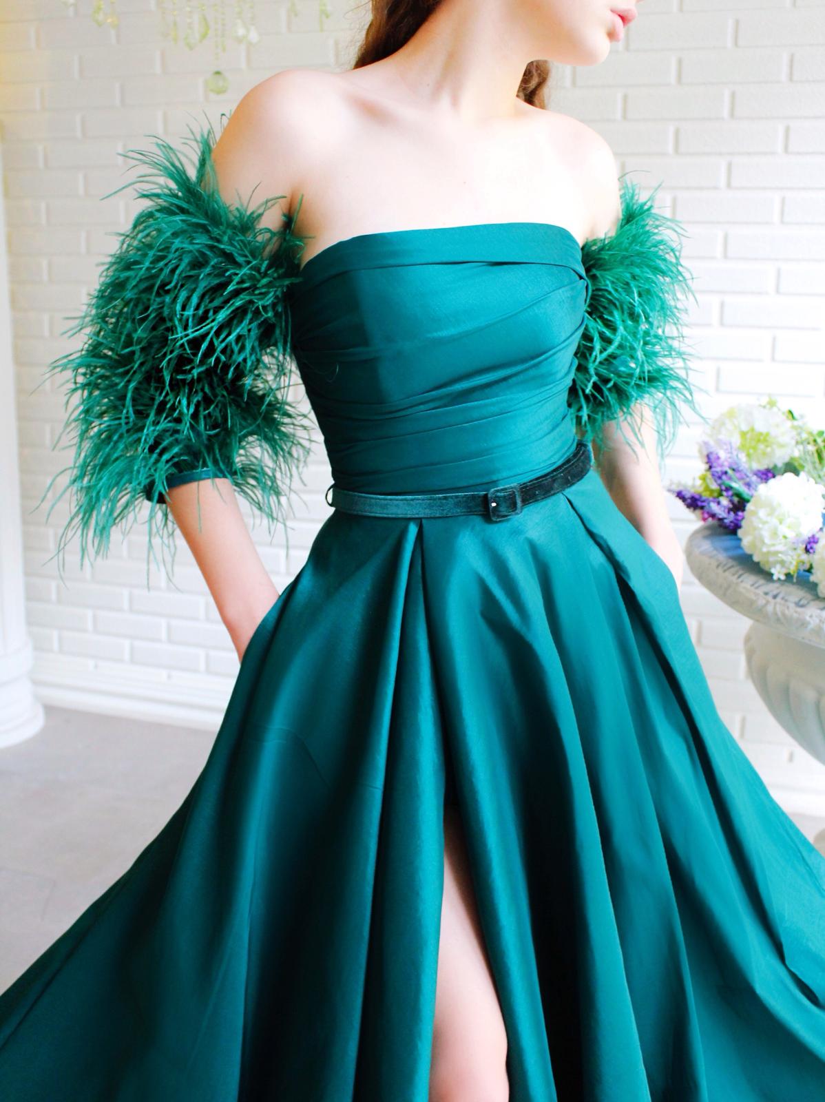 Green A-Line dress with belt, off the shoulder sleeves and feathers