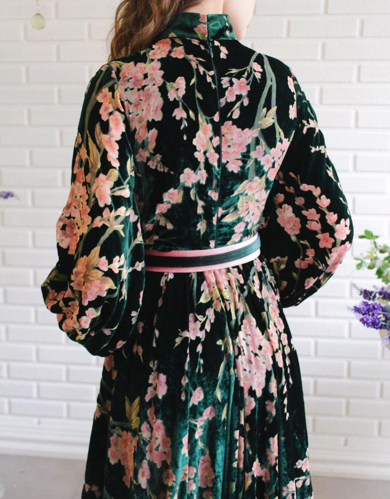 Green A-Line dress with v-neck, long sleeves and printed flowers