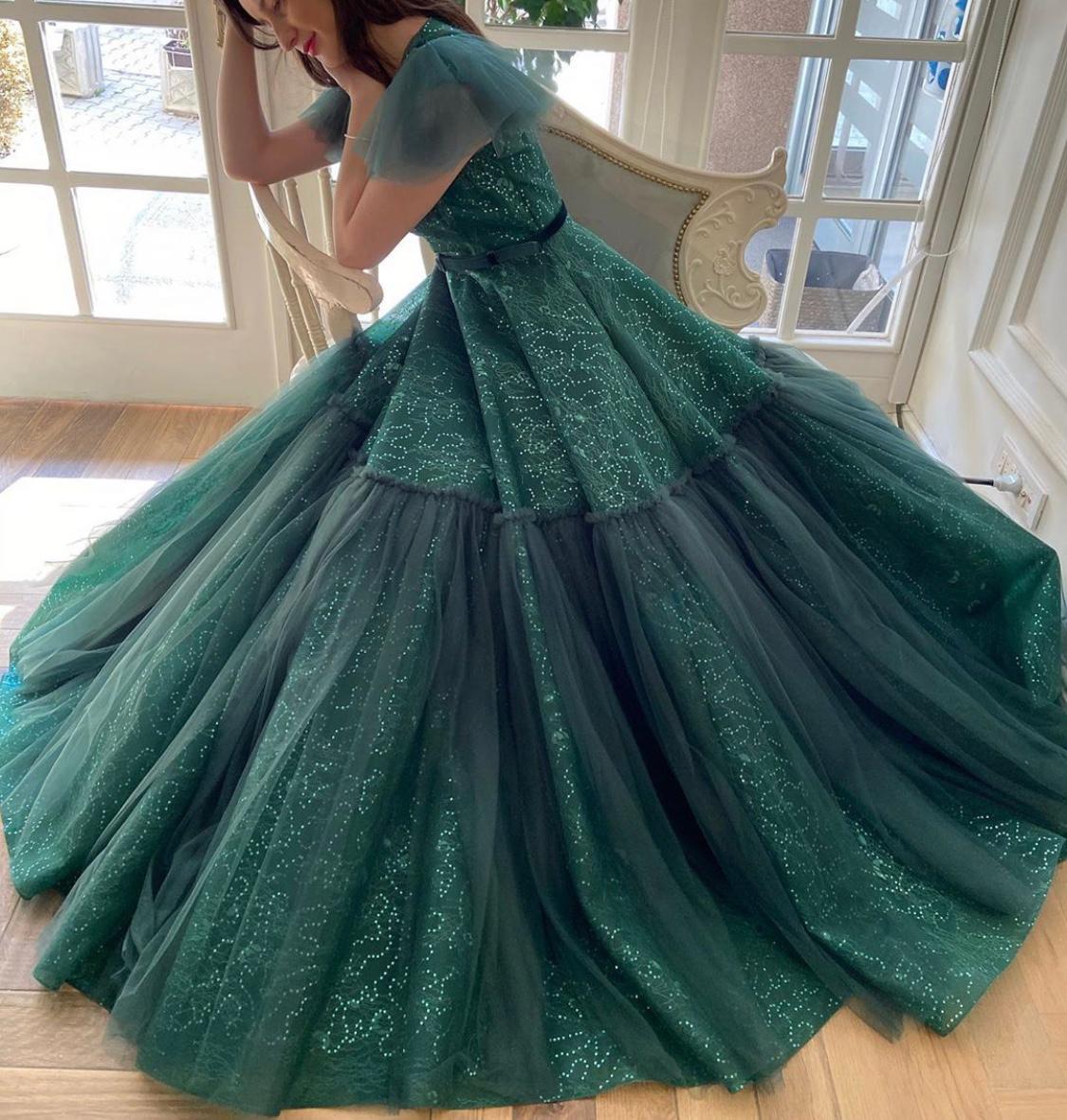Green A-Line dress with no sleeves and embroidery