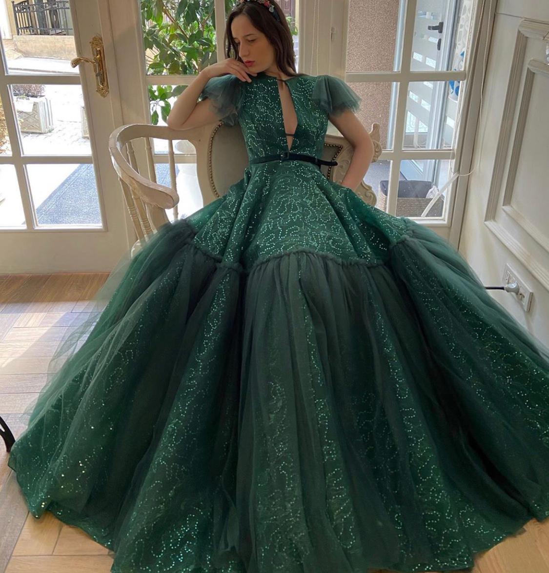 Green A-Line dress with no sleeves and embroidery