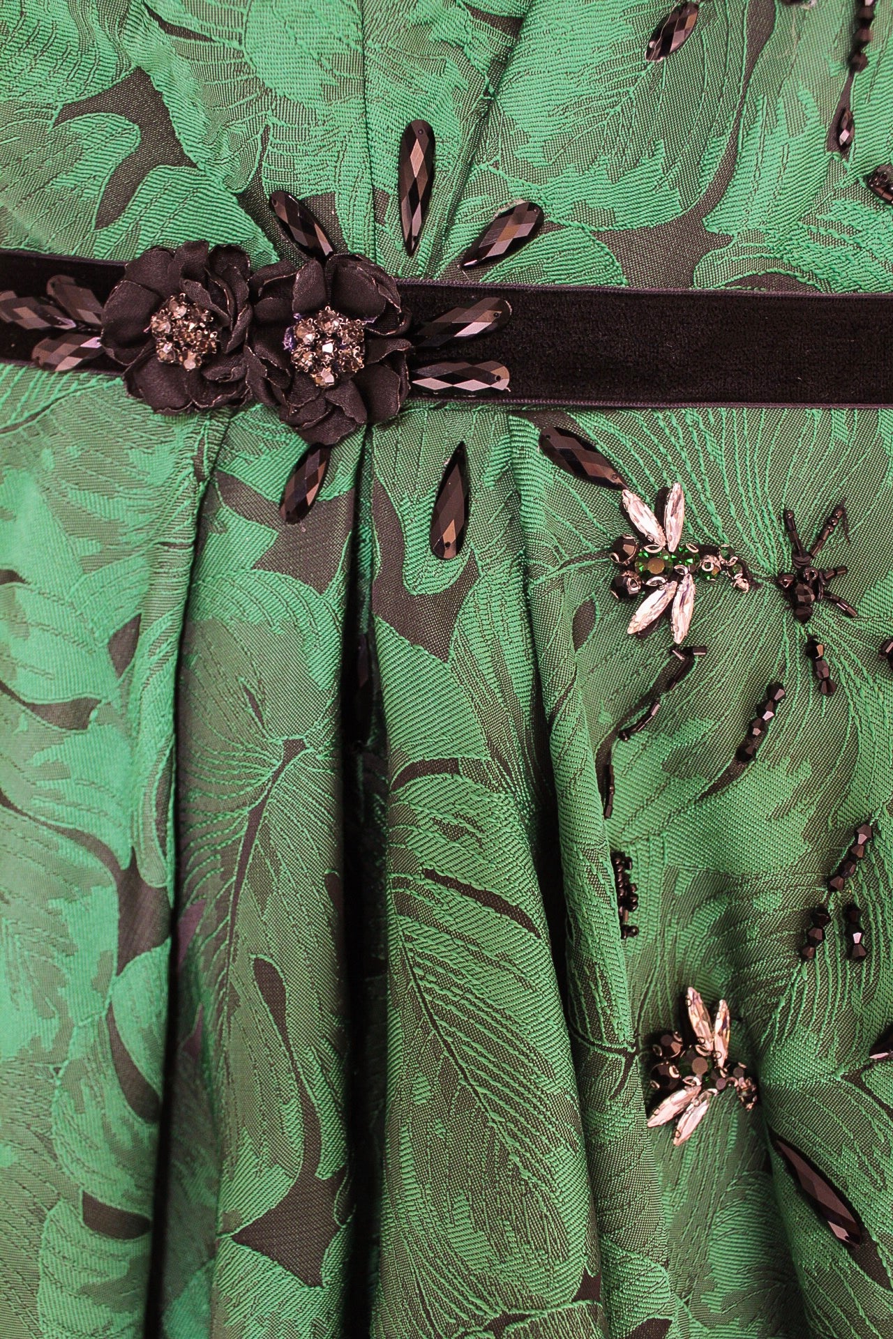 Green A-Line dress with embroidery, v-neck and no sleeves