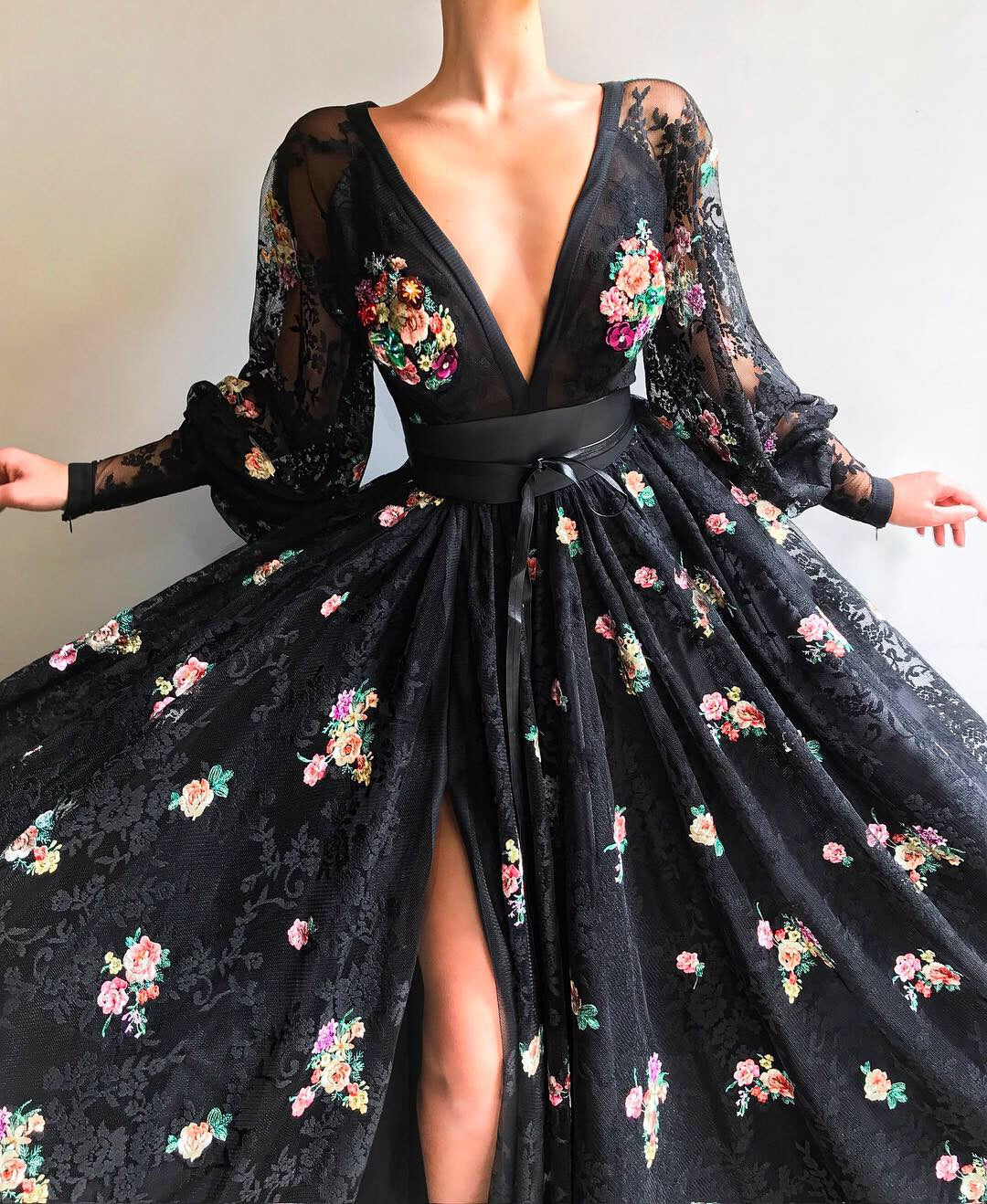 Black A-Line dress with v-neck, long sleeves and embroidery
