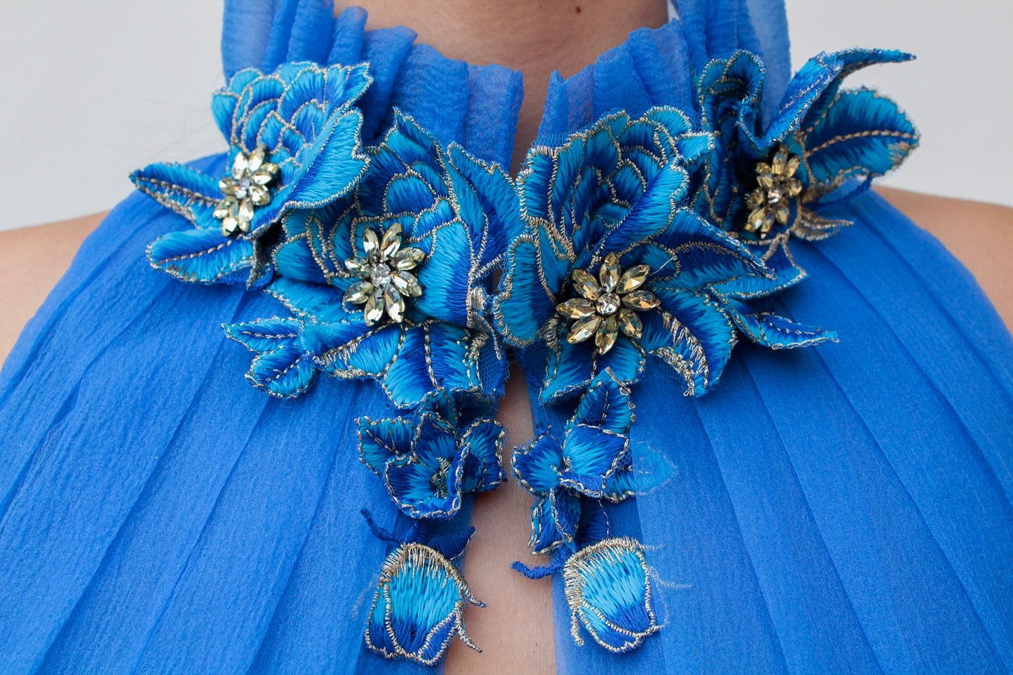 Blue A-Line dress with no sleeves and embroidery