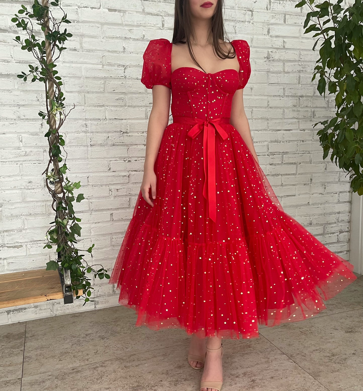 Red midi dress with short sleeves and starry fabric