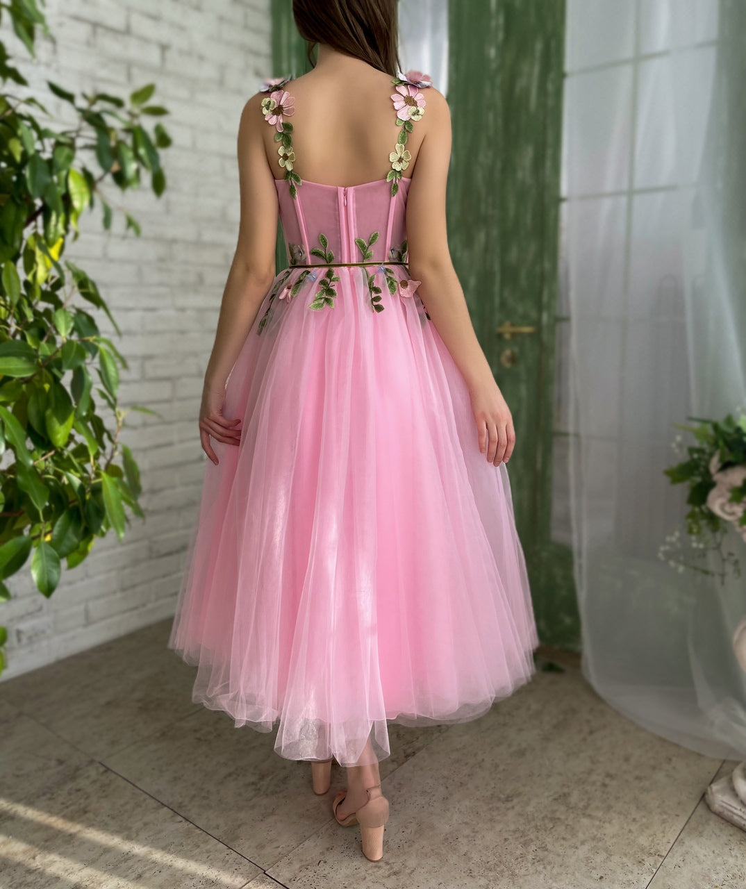 Pink midi dress with spaghetti straps and embroidery
