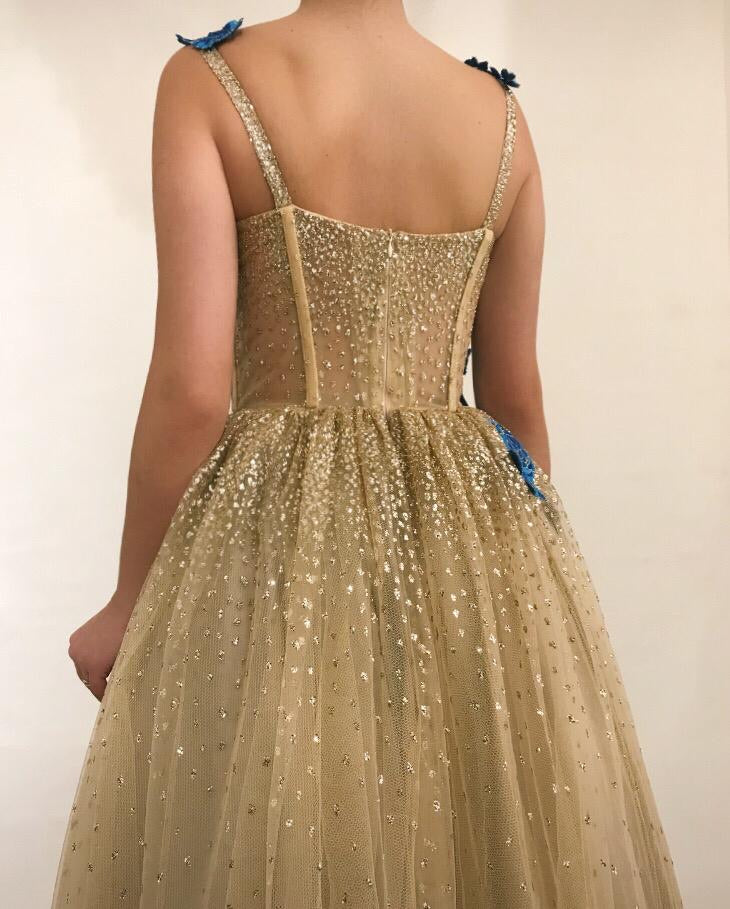 Gold A-Line dress with spaghetti straps and embroidery