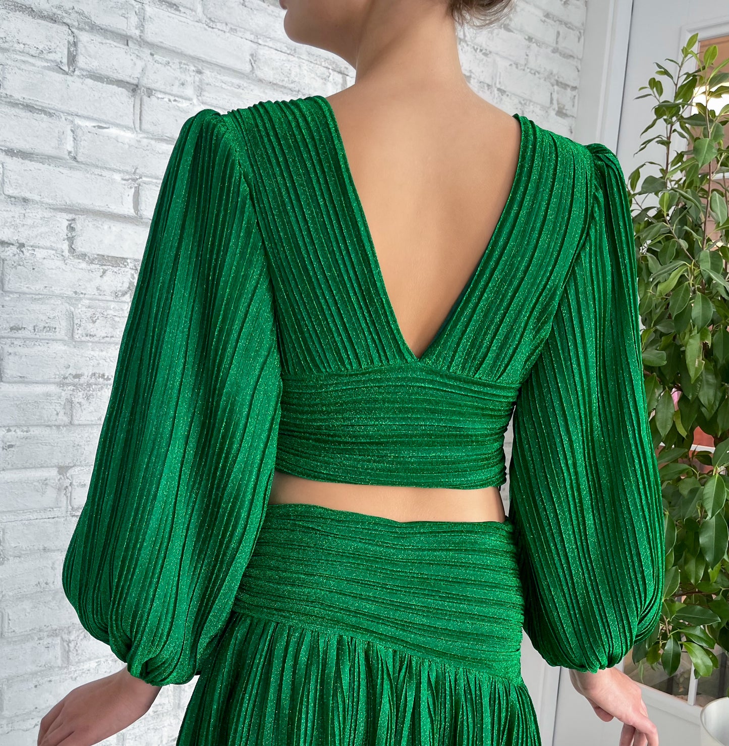 Green blouse with v-neck and long sleeves