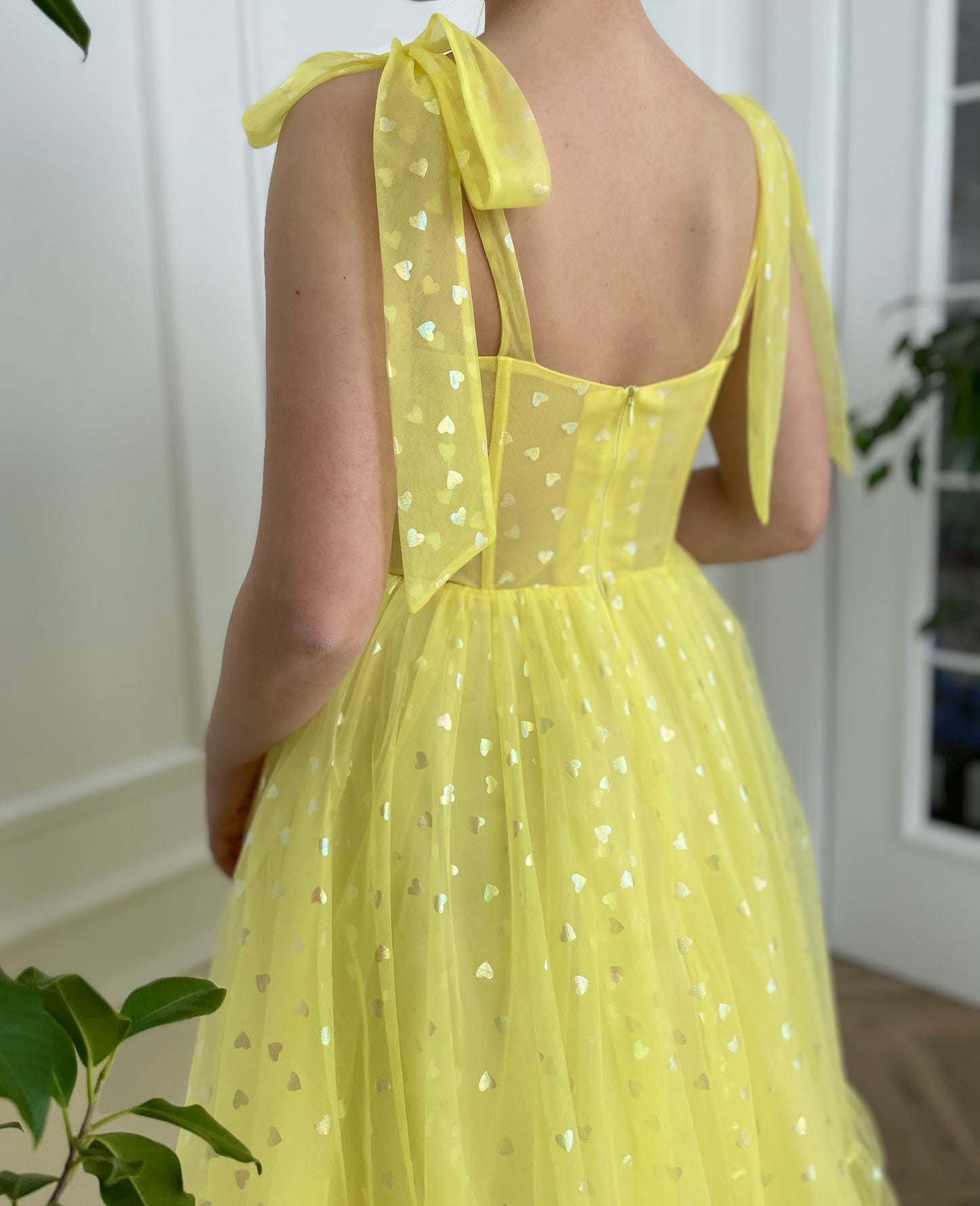 Yellow midi dress with bow straps and hearty fabric