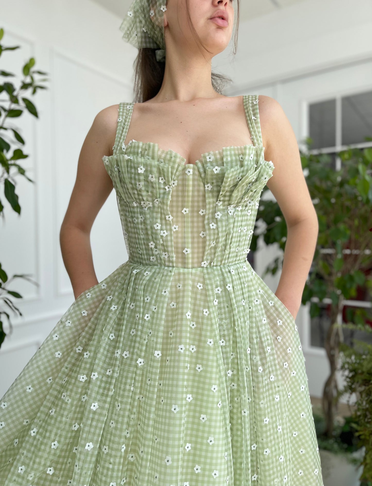 Green midi dress with daisies and straps