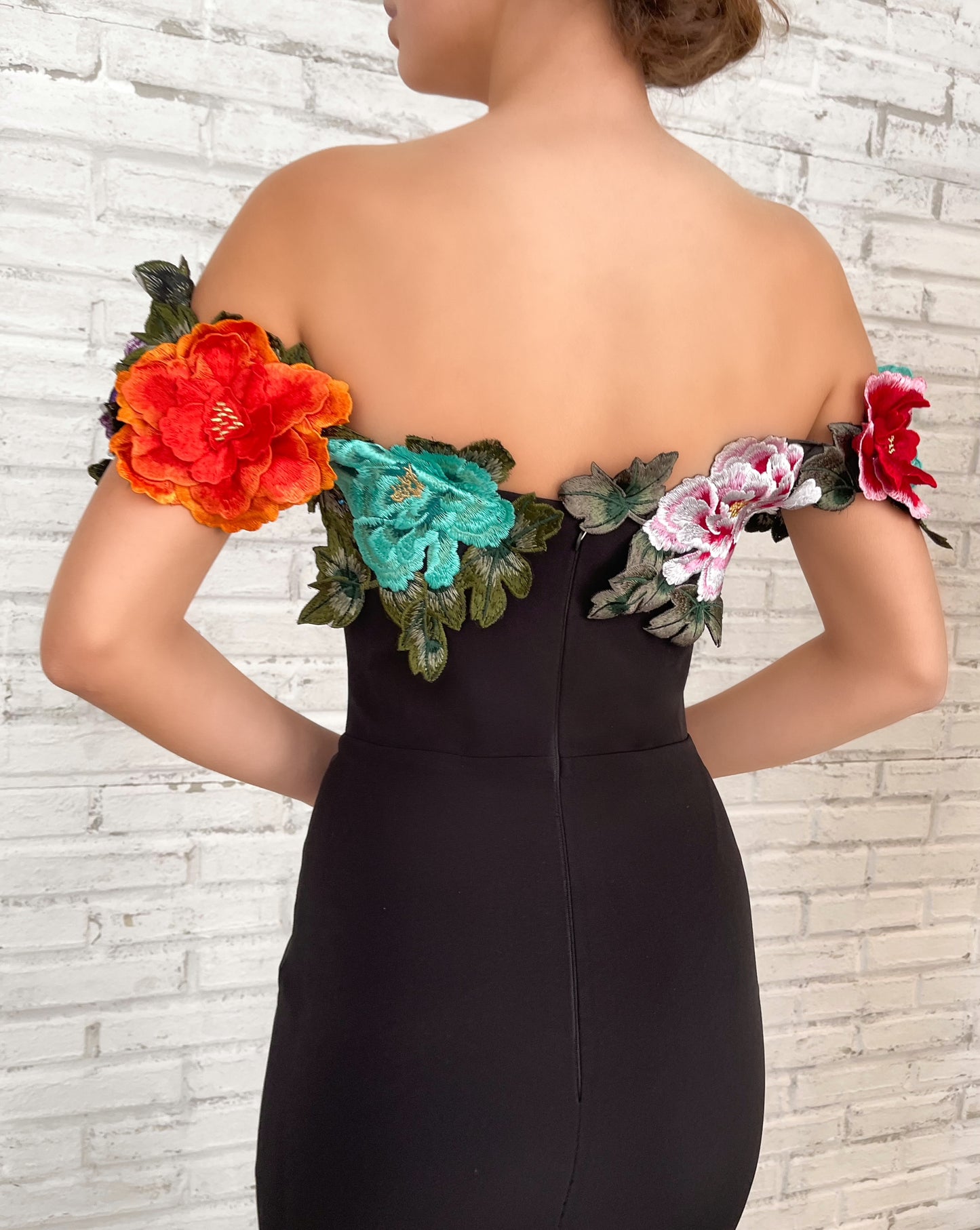 Black mermaid dress with off the shoulder sleeves and embroidery
