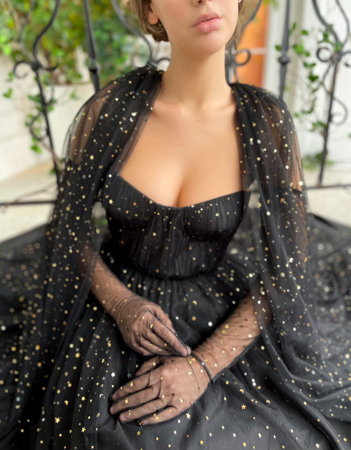 Black A-Line dress with cape sleeves, gloves and starry fabric