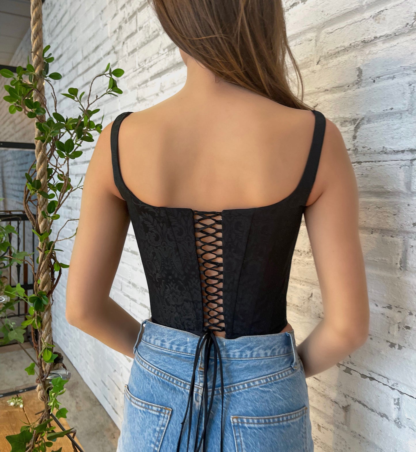Black corset with straps and embroidery