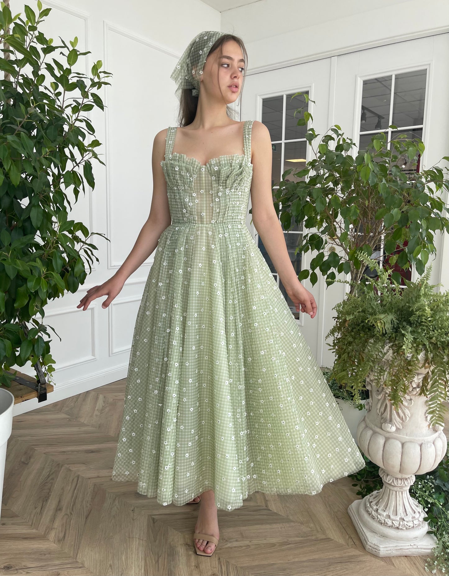 Green midi dress with daisies and straps