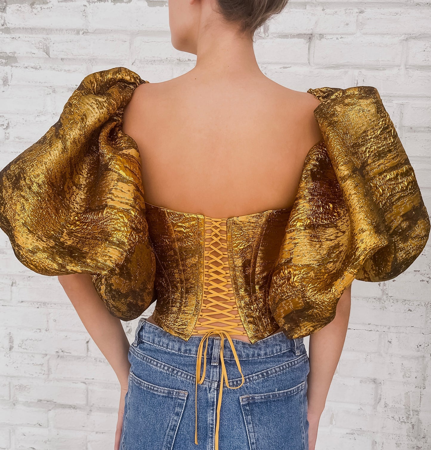 Gold corset with short puff sleeves