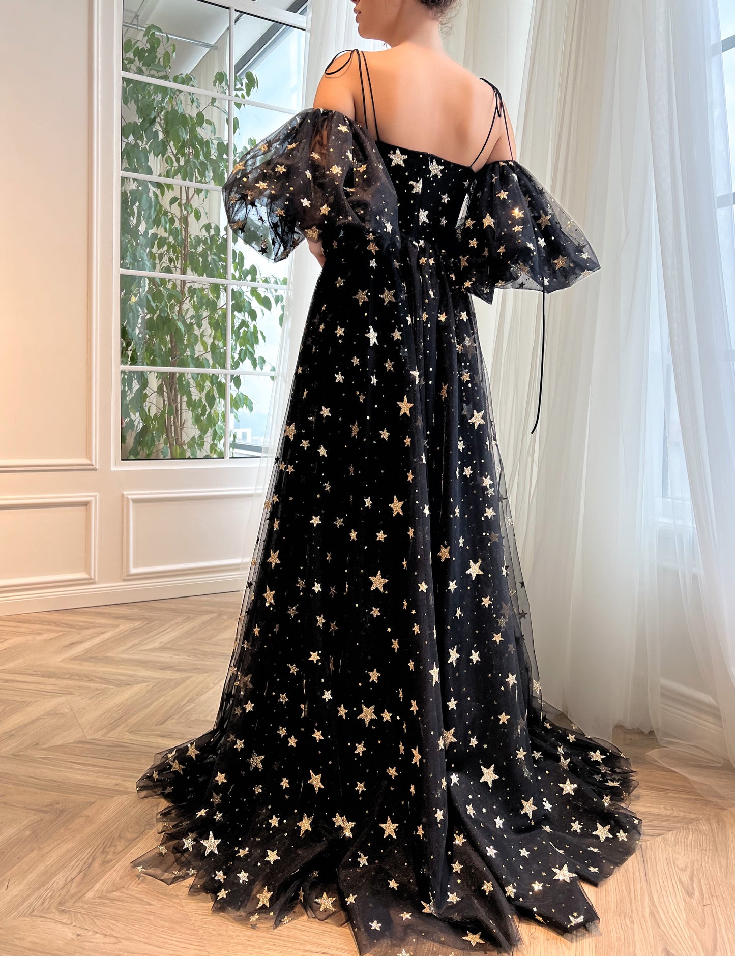 Black A-Line dress with spaghetti straps, off the shoulder sleeves and starry fabric