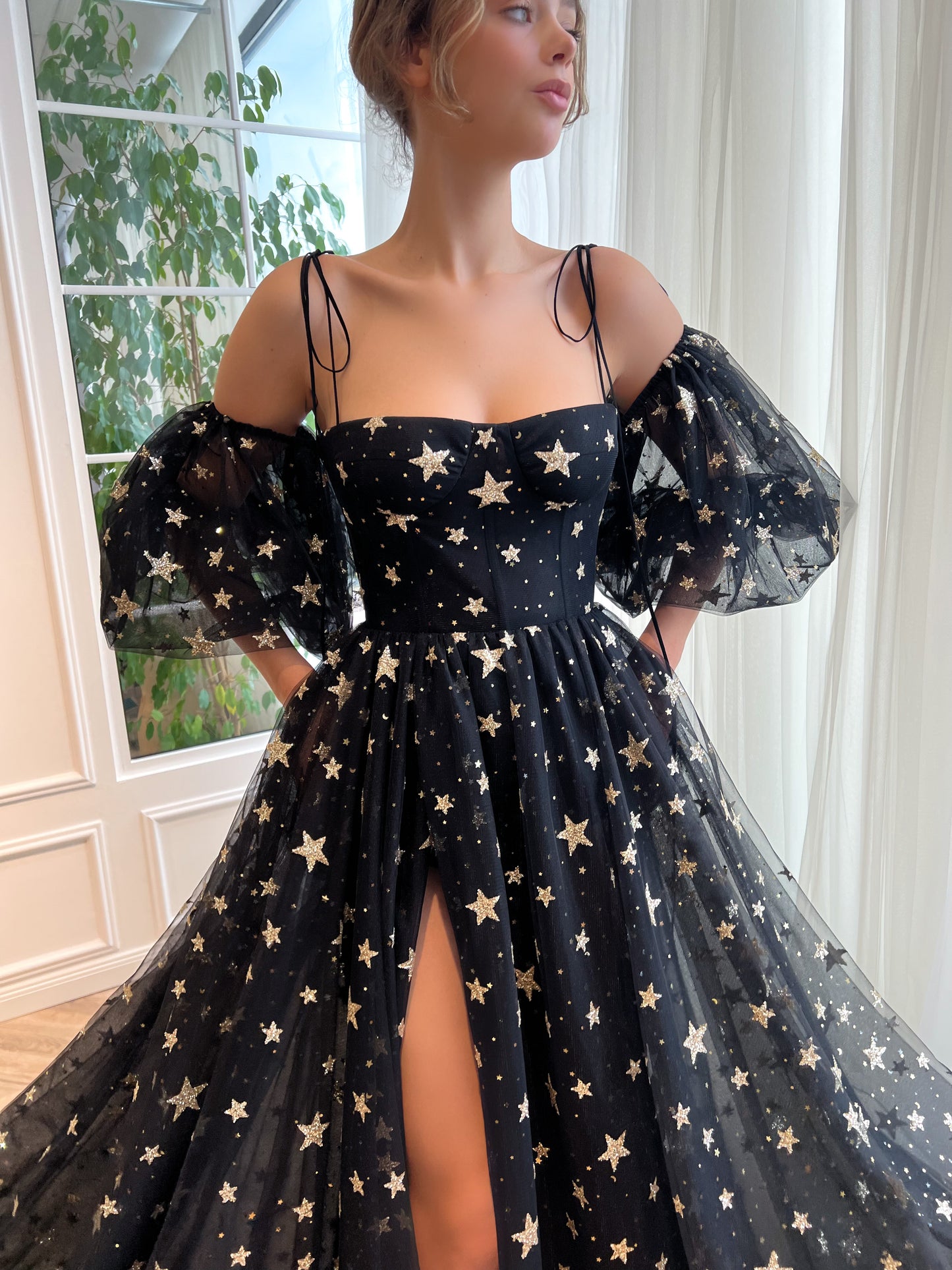 Black A-Line dress with spaghetti straps, off the shoulder sleeves and starry fabric