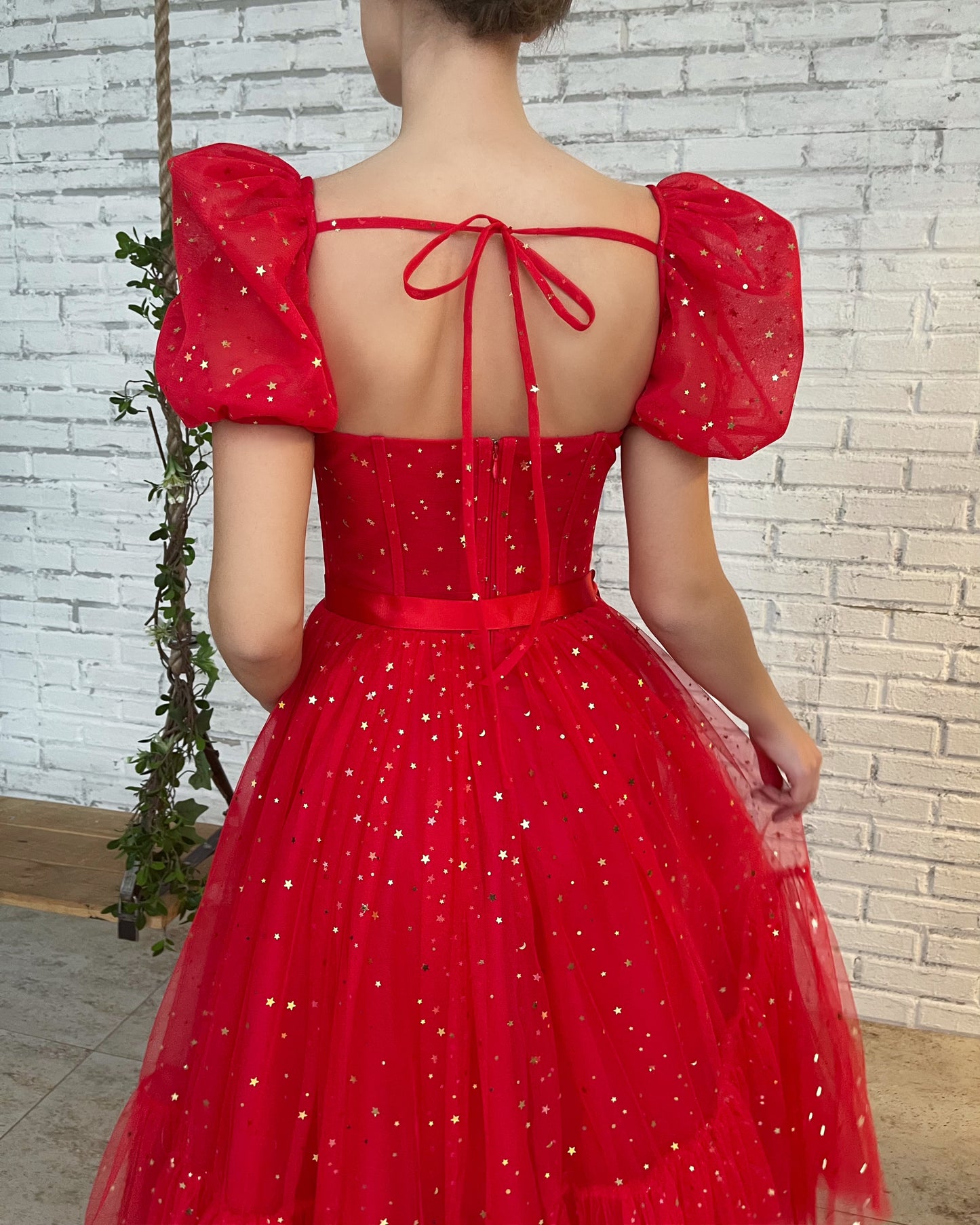 Red midi dress with short sleeves and starry fabric