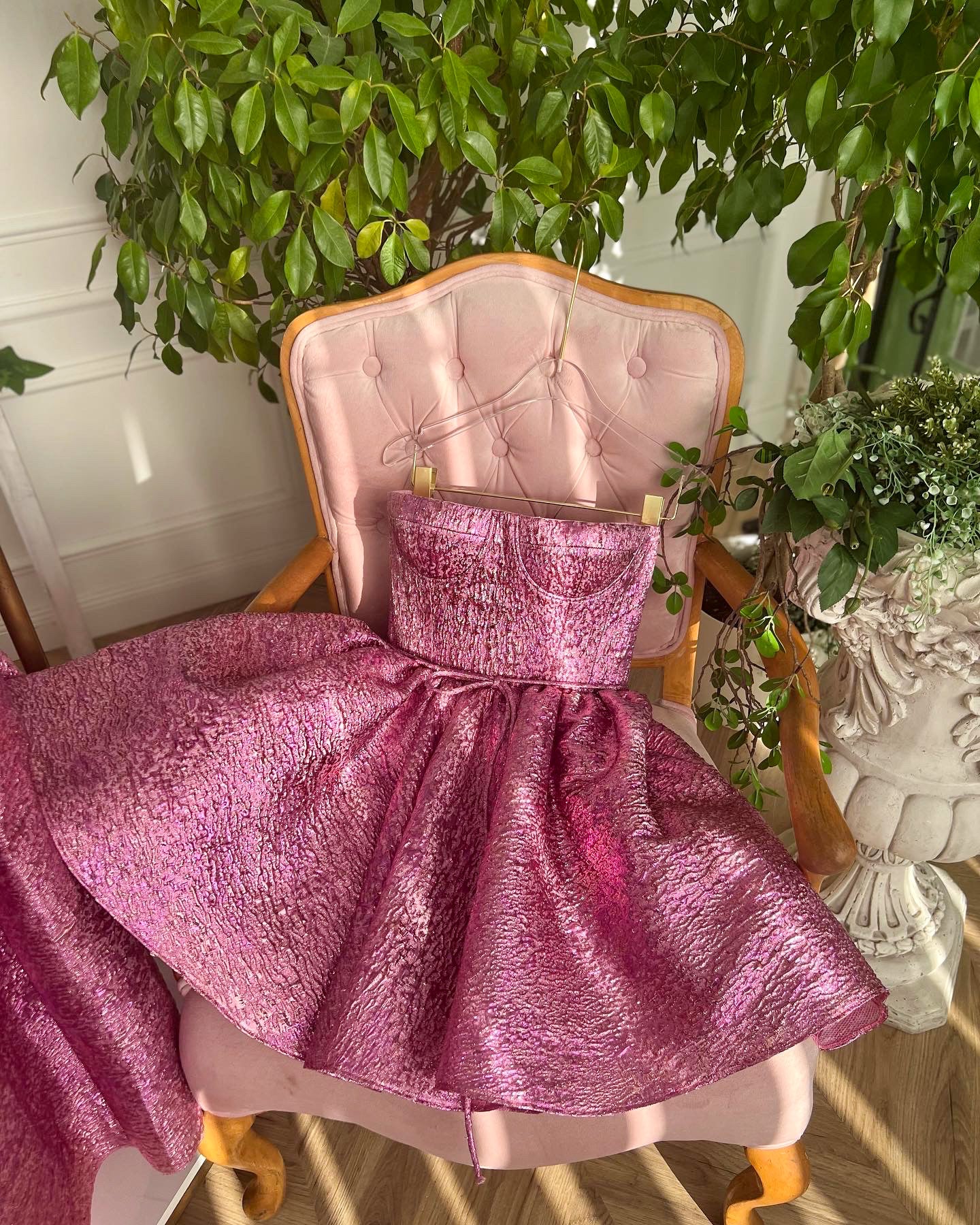 Pink mini dress with off the shoulder sleeves and taffeta brocade fabric