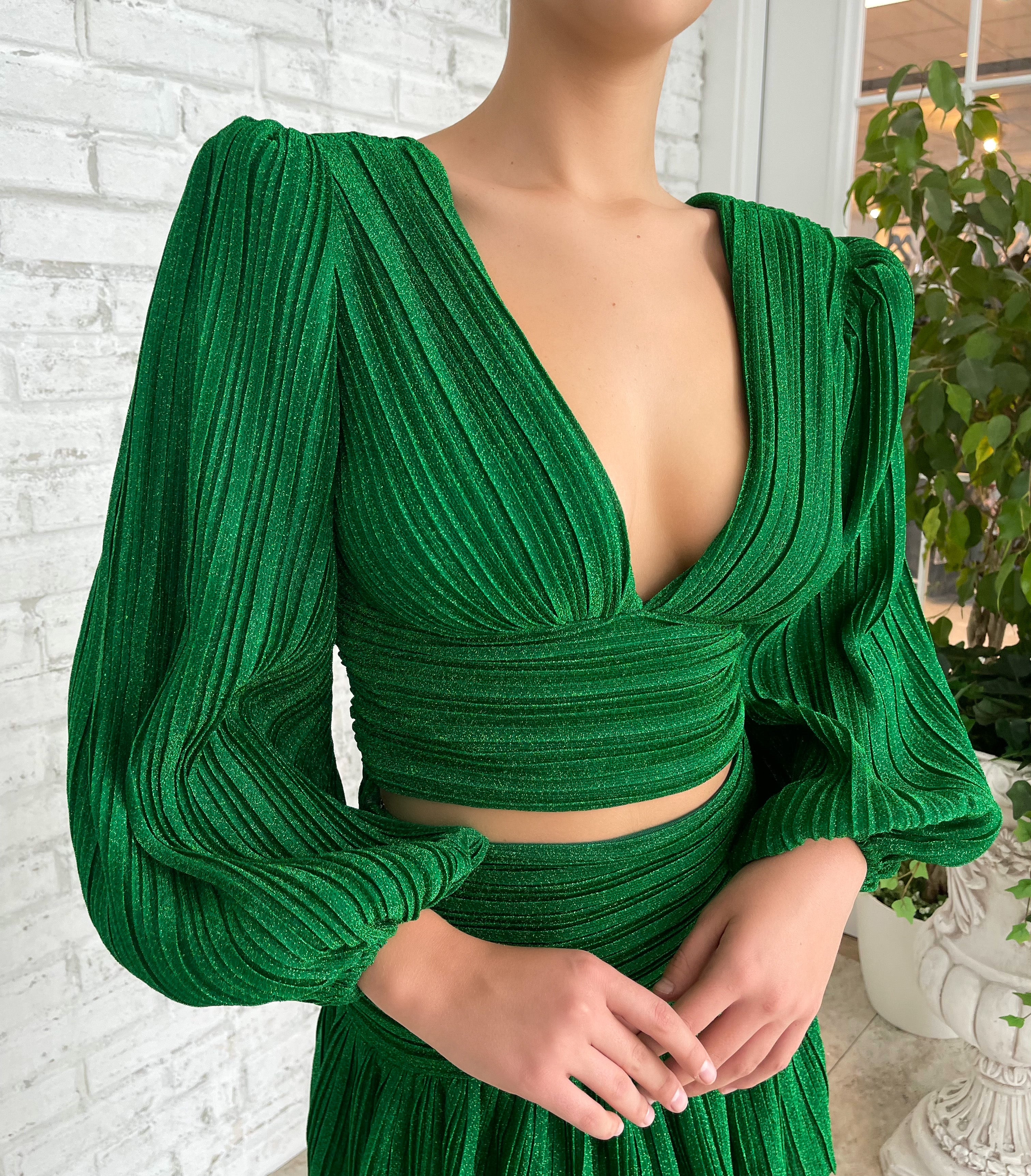 Green blouse with v-neck and long sleeves