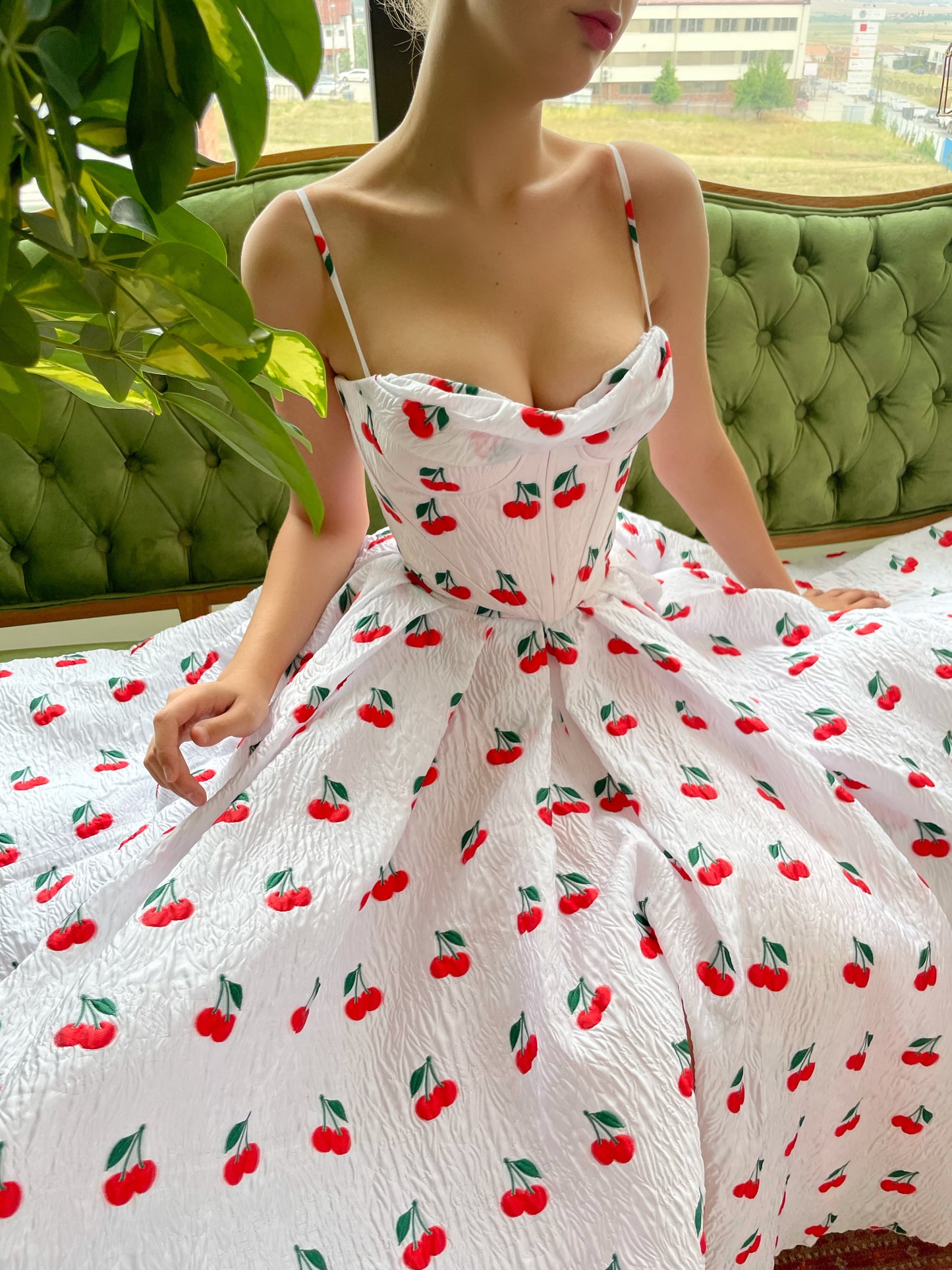 White two piece dress with spaghetti straps and printed cherries