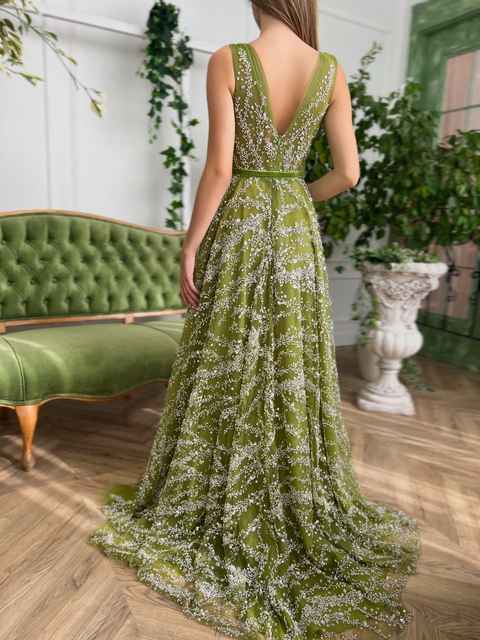 Green A-Line dress with no sleeves and v-neck