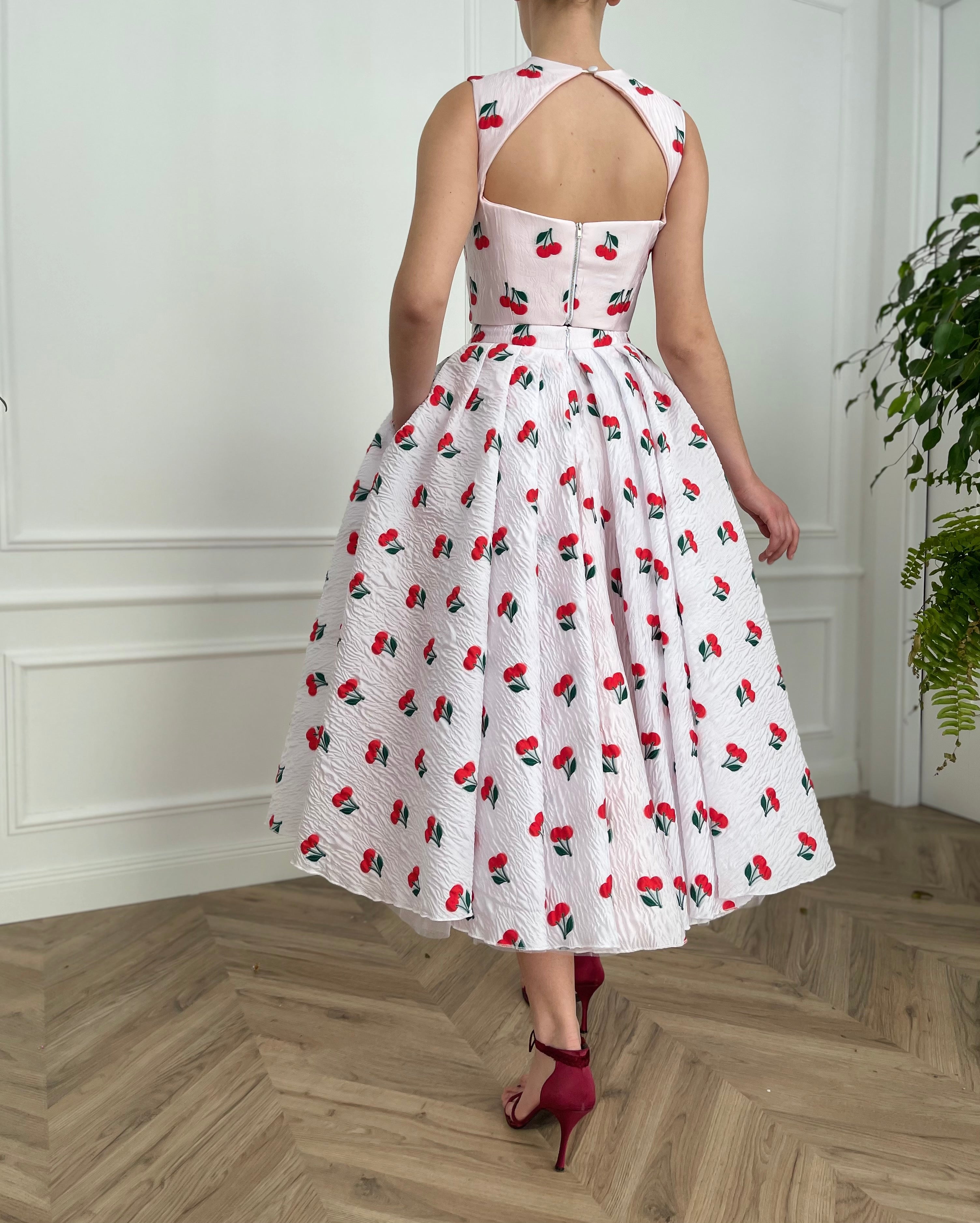 White two piece dress with printed cherries and straps
