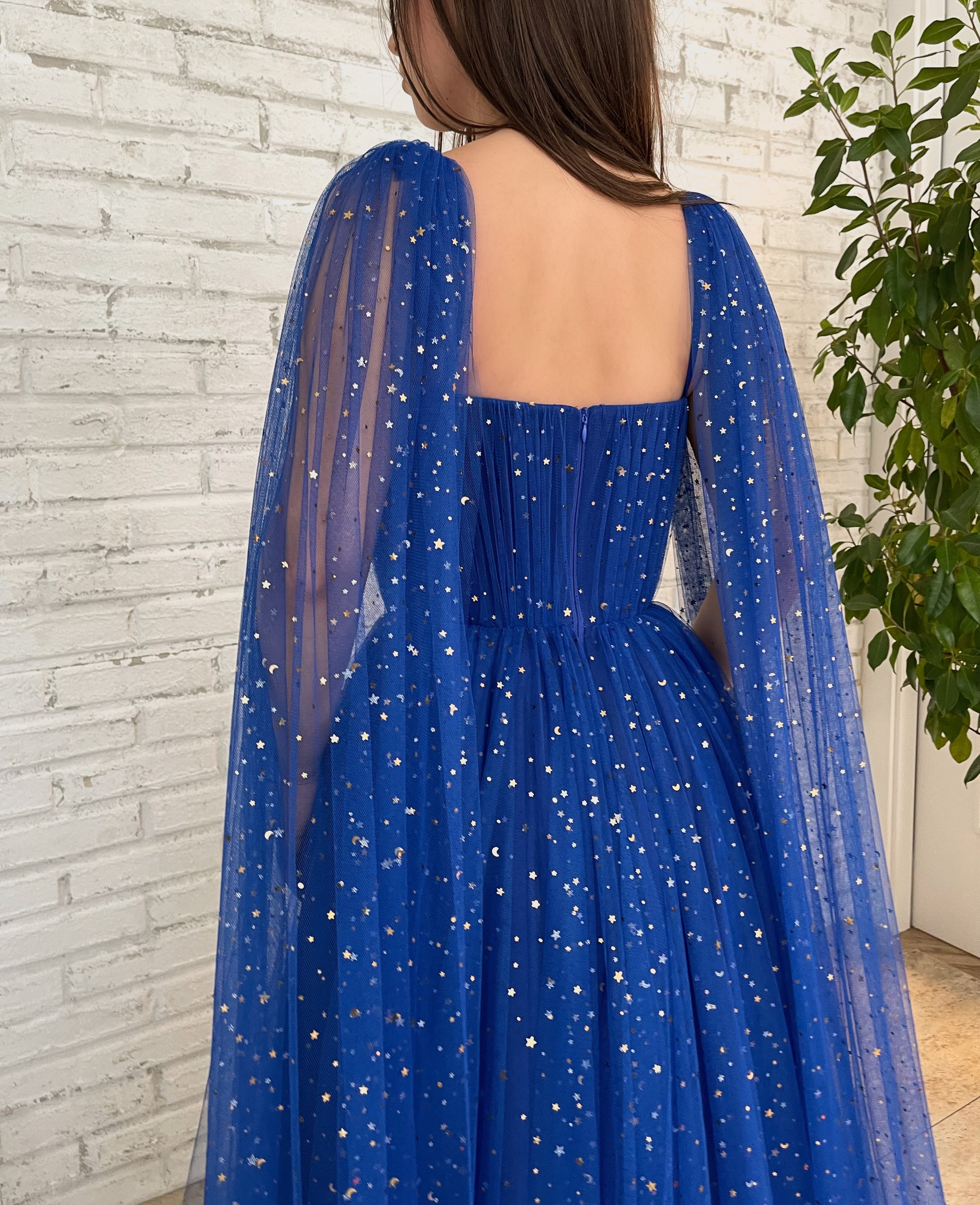 Blue A-Line dress with cape sleeves, spaghetti straps and starry fabric