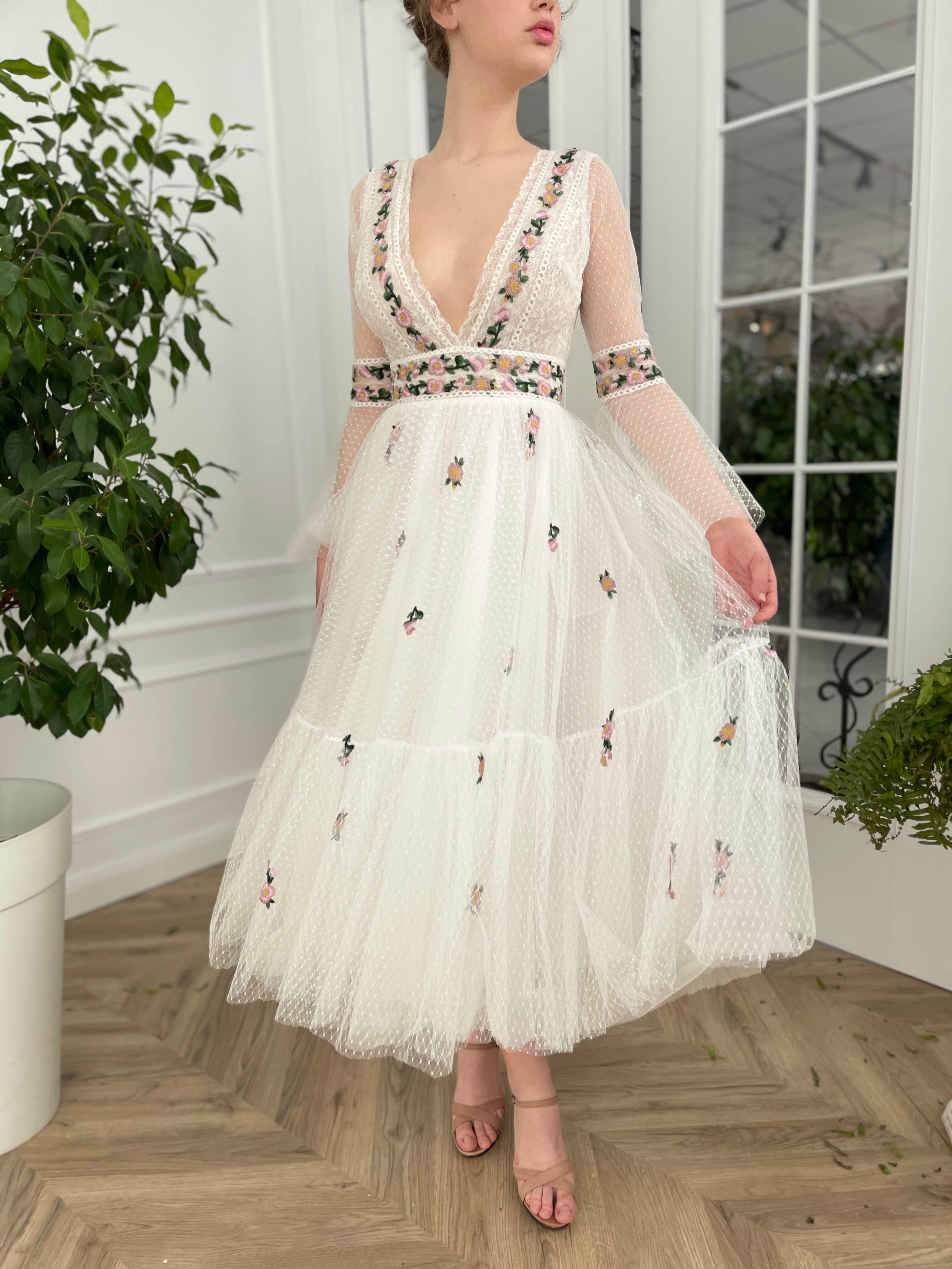 Midi white bridal dress with embroidered flowers, v-neck and long sleeves