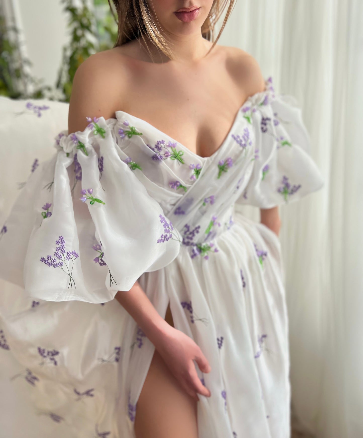 White A-Line dress with short off the shoulder sleeves and printed flowers