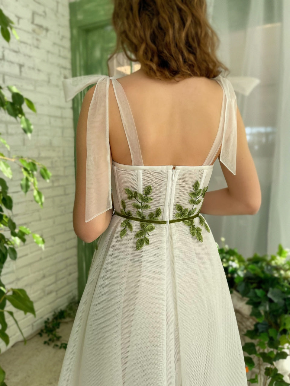 White midi dress with bow straps and embroidery