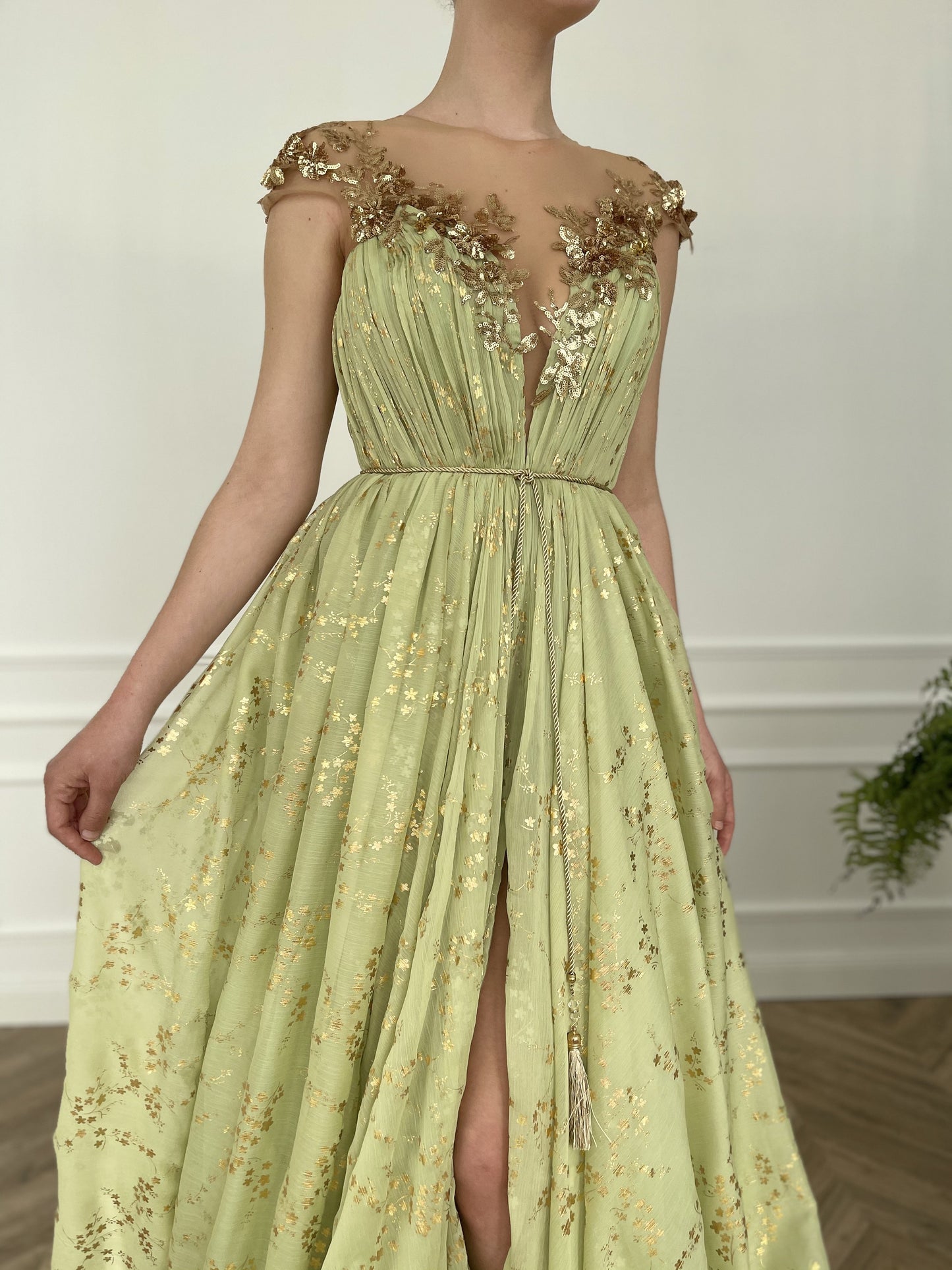 Green A-Line dress with cap sleeves, v-neck and embroidery