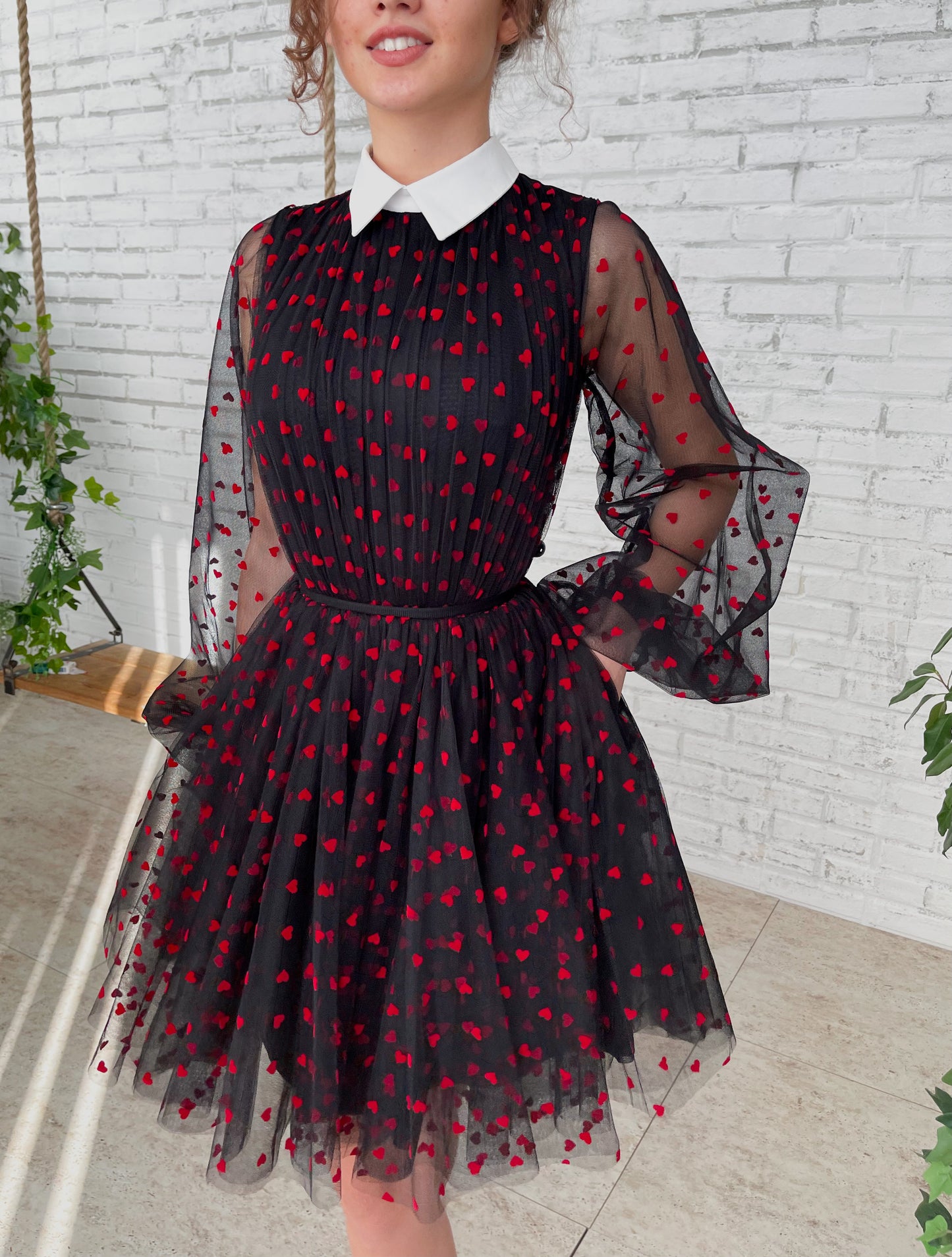 Black mini dress with long sleeves and hearty fabric