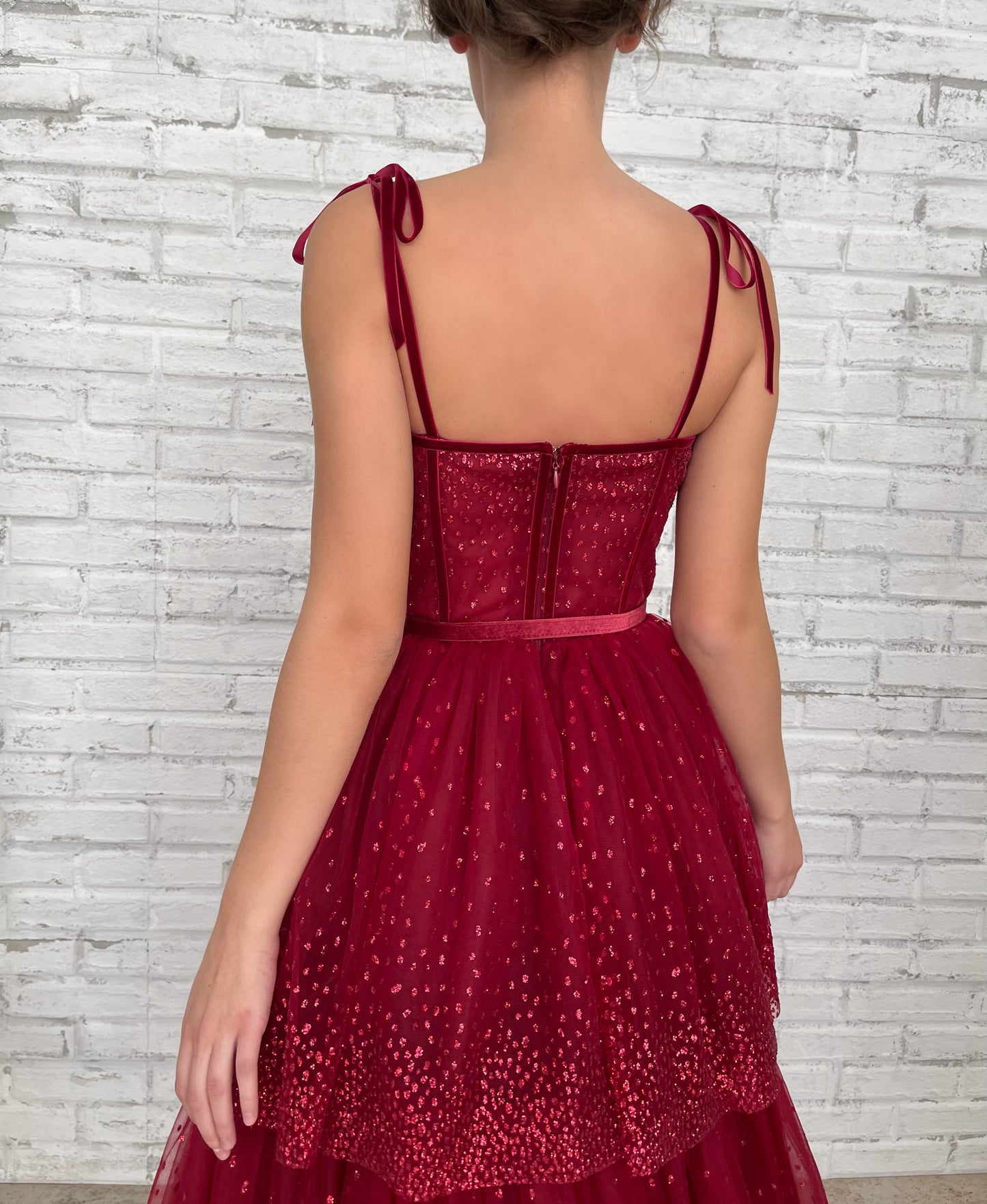 Red midi dress with spaghetti straps and belt