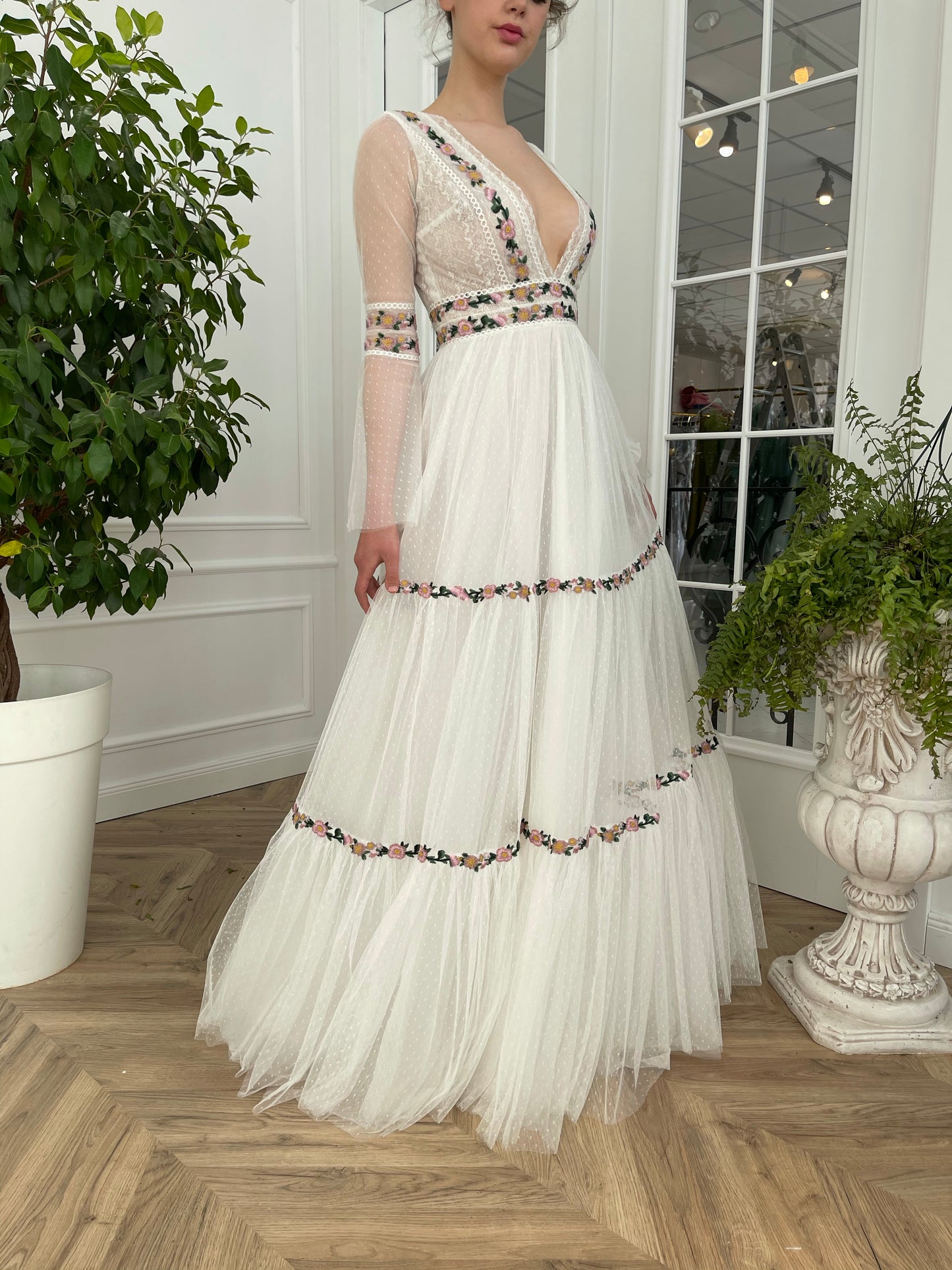 A Line white bridal dress with v-neck, long sleeves and embroidered flowers