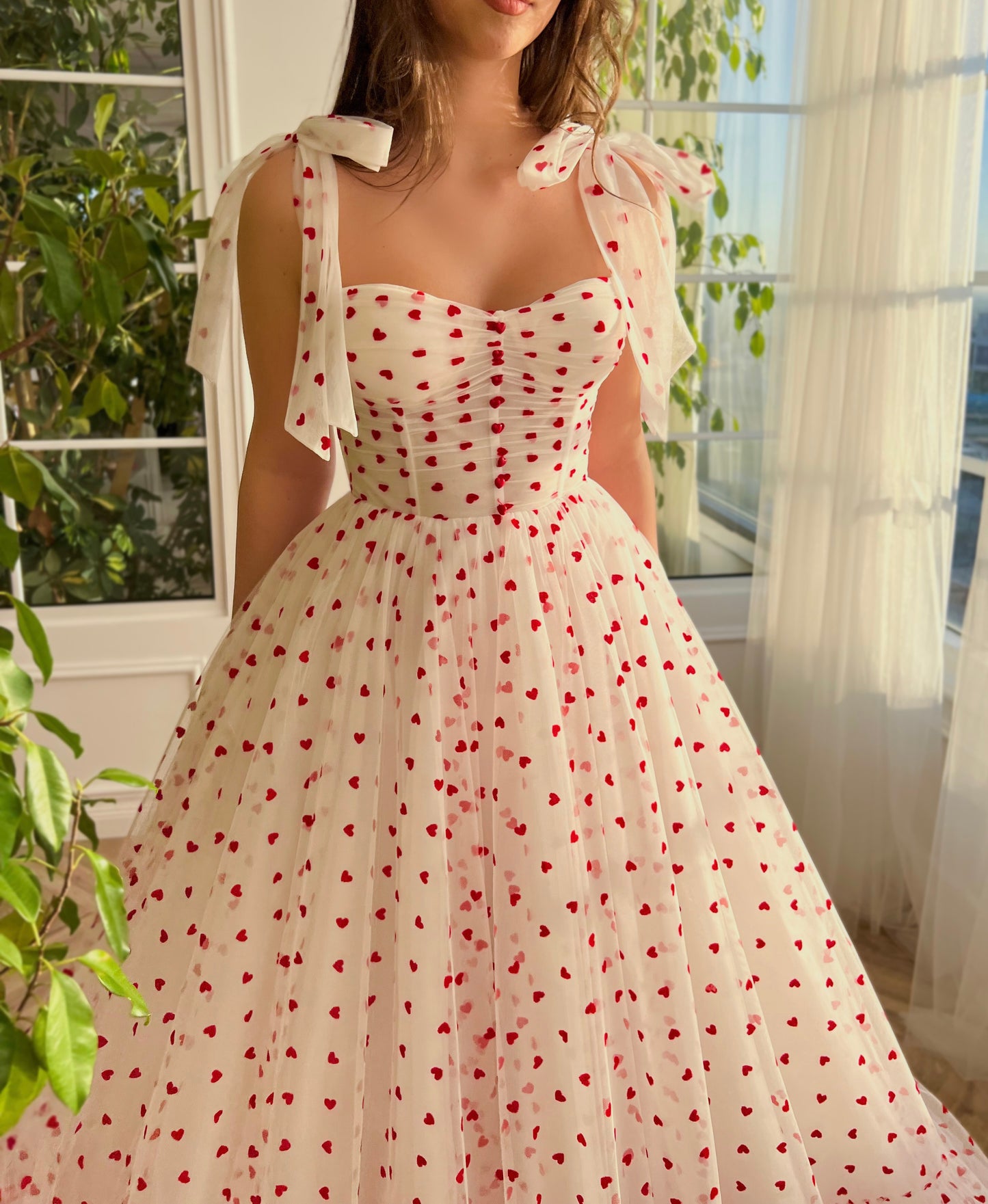 White A-Line dress with hearty print and bow straps