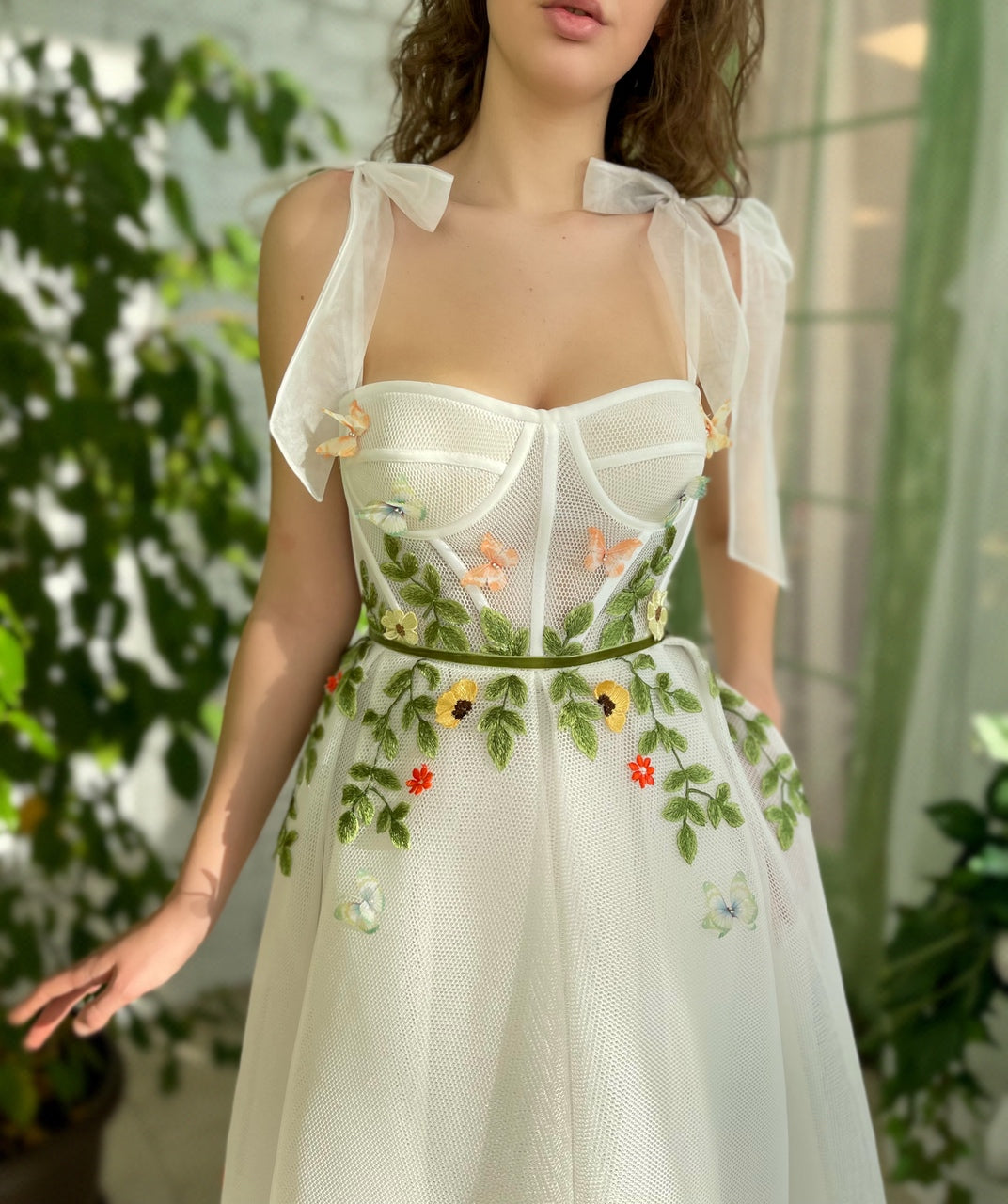 White midi dress with bow straps and embroidery