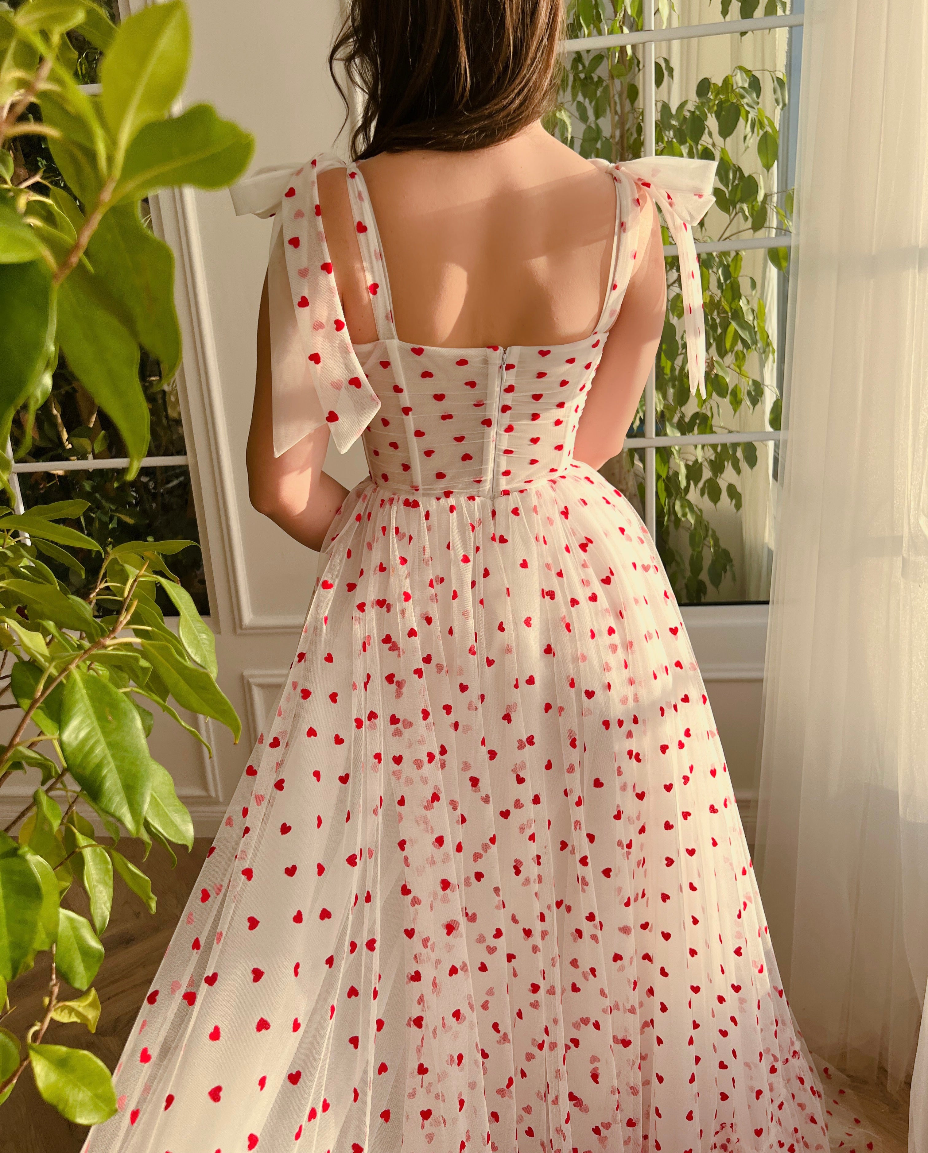 White A-Line dress with hearty print and bow straps
