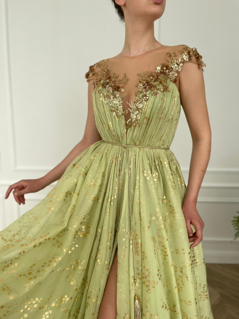 Green A-Line dress with cap sleeves, v-neck and embroidery